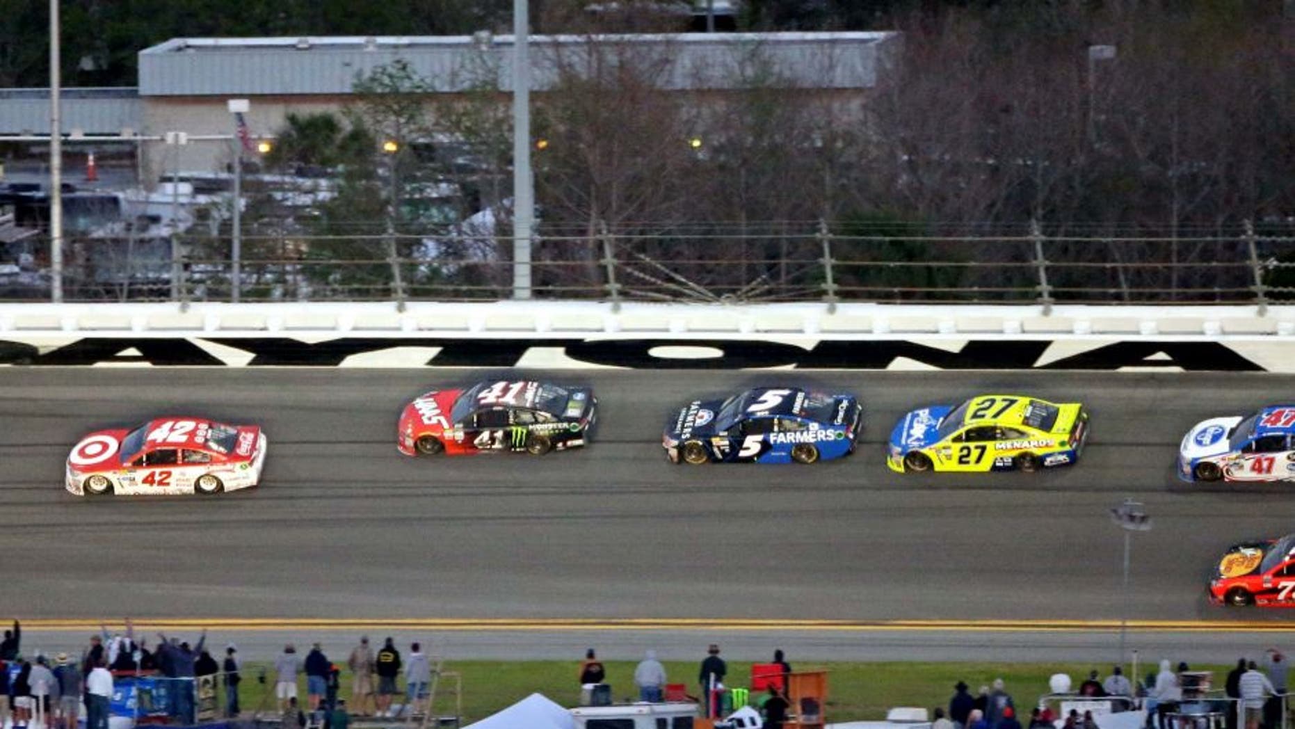 Feb 26, 2017; Daytona Beach, FL, USA; NASCAR Cup Series driver Kyle Larson (42) and NASCAR Cup Series driver Kurt Busch (41) lead the field during the 2017 Daytona 500 at Daytona International Speedway. Mandatory Credit: John David Mercer-USA TODAY Sports