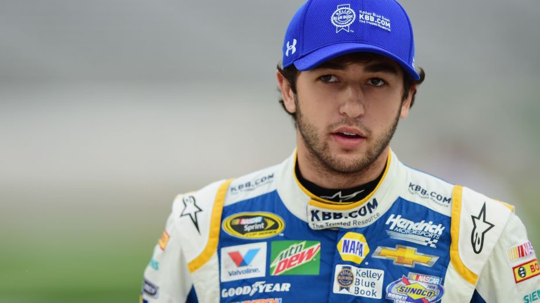 FORT WORTH, TX - NOVEMBER 04: Chase Elliott, driver of the #24 Kelley Blue Book Chevrolet, stands on the grid during Salute to Veterans Qualifying Fueled by Texas Lottery for the NASCAR Sprint Cup Series AAA Texas 500 at Texas Motor Speedway on November 4, 2016 in Fort Worth, Texas. (Photo by Jared C. Tilton/Getty Images)