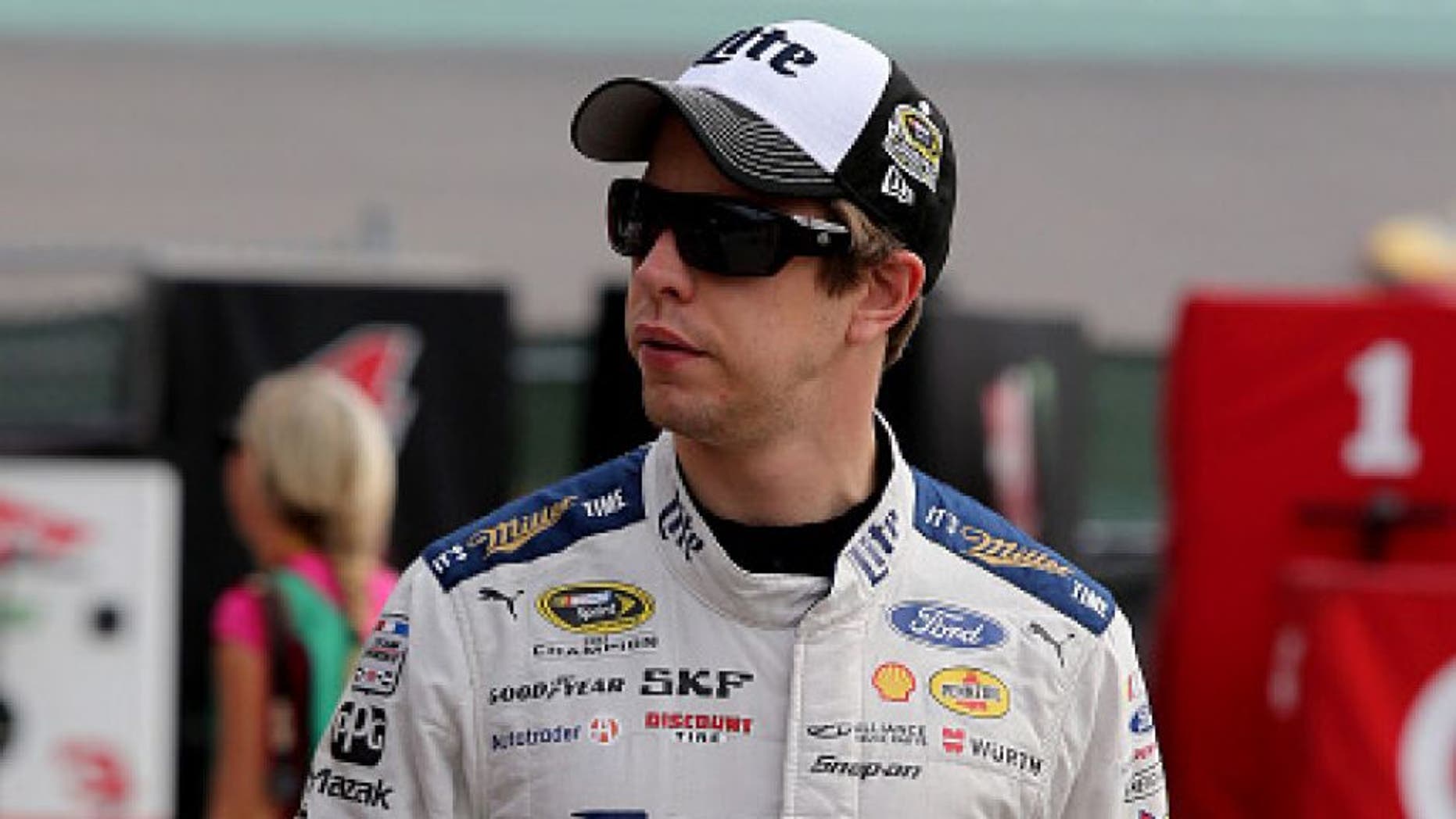 HOMESTEAD, FL - NOVEMBER 19: Brad Keselowski, driver of the #2 Miller Lite Ford, walks through the garage area during practice for the NASCAR Sprint Cup Series Ford EcoBoost 400 at Homestead-Miami Speedway on November 19, 2016 in Homestead, Florida. (Photo by Jerry Markland/Getty Images)