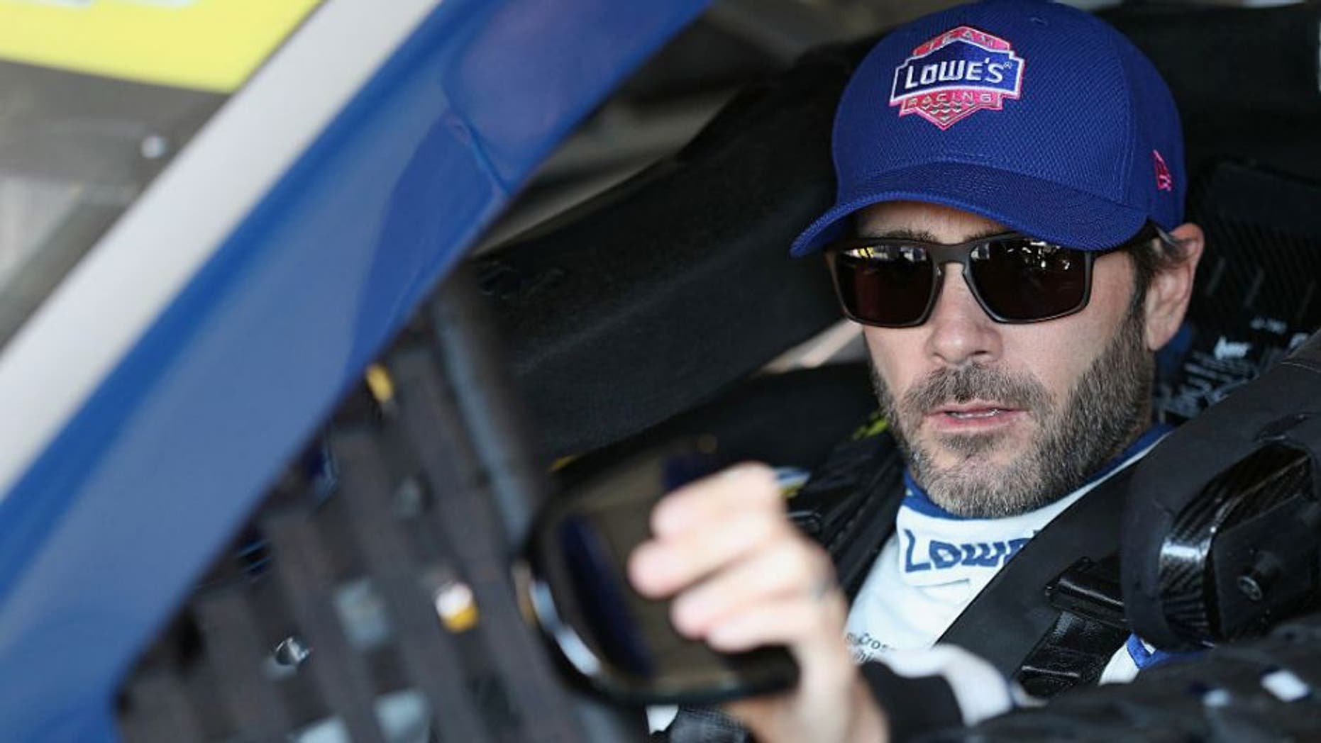 TALLADEGA, AL - OCTOBER 21: Jimmie Johnson, driver of the #48 Lowe's Pro Services Chevrolet, sits in his car during practice for the NASCAR Sprint Cup Series Hellmann's 500 at Talladega Superspeedway on October 21, 2016 in Talladega, Alabama. (Photo by Patrick Smith/Getty Images)