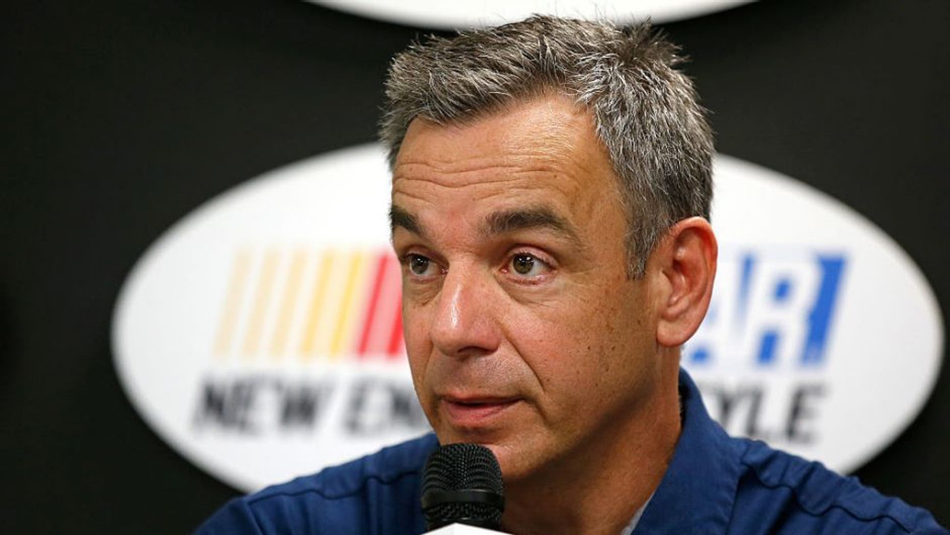 LOUDON, NH - JULY 15: Doug Duchardt, general manager at Hendrick Motorsports, speaks during a press conference prior to practice for the NASCAR Sprint Cup Series New Hampshire 301 at New Hampshire Motor Speedway on July 16, 2016 in Loudon, New Hampshire. Duchardt announced that Alex Bowman will replace Dale Earnhardt Jr. in New Hampshire due to concussion-like symptoms. (Photo by Todd Warshaw/NASCAR via Getty Images)