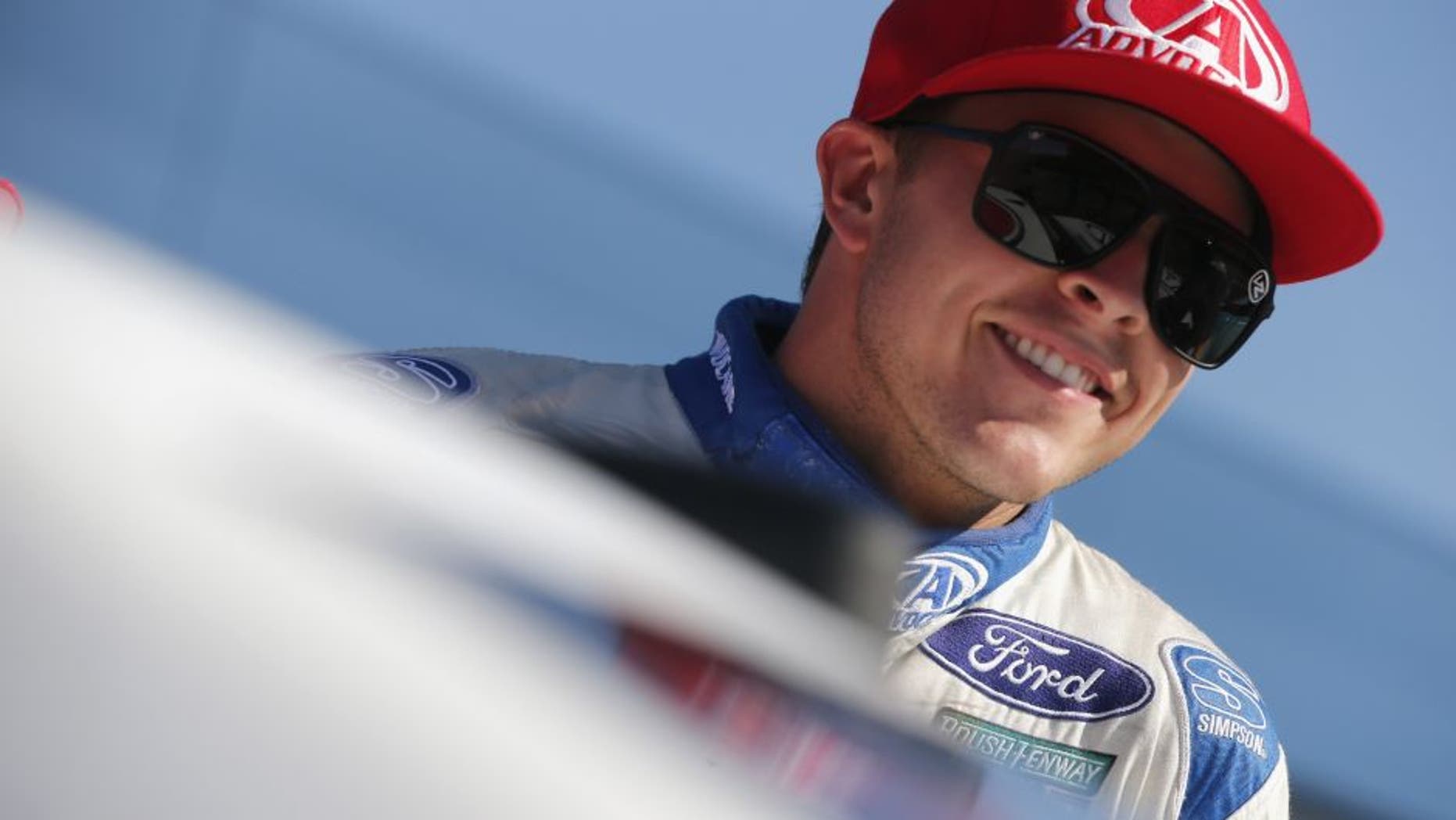 BROOKLYN, MI - AUGUST 26: Trevor Bayne, driver of the #6 AdvoCare Ford, smiles during qualifying for the NASCAR Sprint Cup Series Pure Michigan 400 at Michigan International Speedway on August 26, 2016 in Brooklyn, Michigan. (Photo by Brian Lawdermilk/NASCAR via Getty Images)
