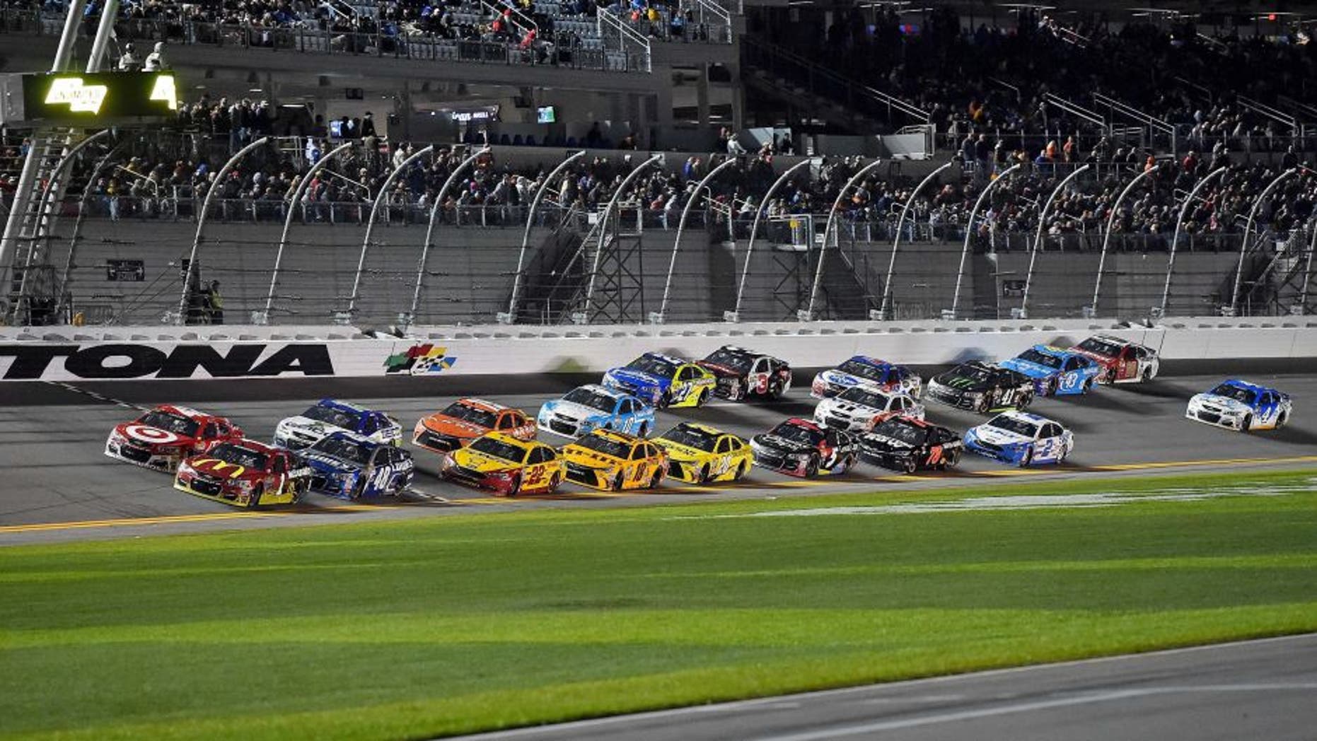 Feb 13, 2016; Daytona Beach, FL, USA; NASCAR Sprint Cup Series driver Jamie Mcmurray (1) and NASCAR Sprint Cup Series driver Kyle Larson (42) lead a pack of cars during The Sprint Unlimited at Daytona International Speedway. Mandatory Credit: Jasen Vinlove-USA TODAY Sports