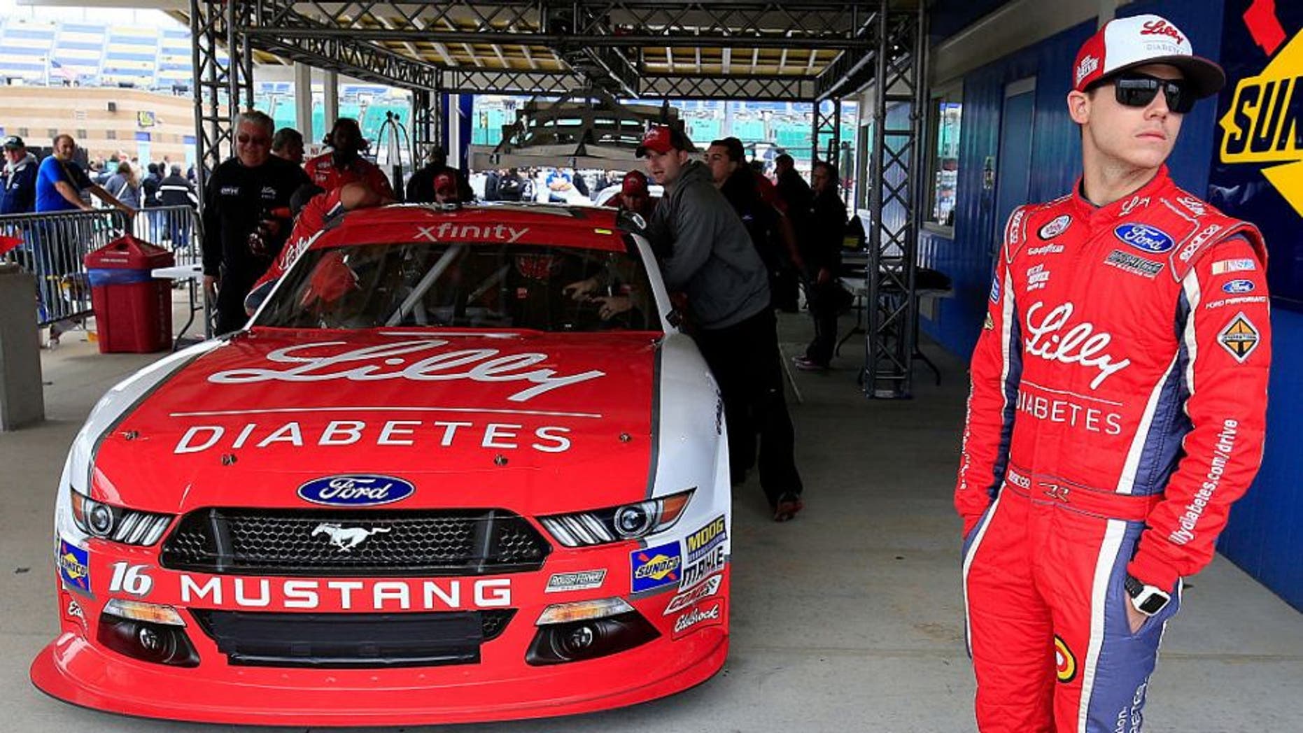 KANSAS CITY, KS - OCTOBER 15: Ryan Reed, driver of the #16 Lilly Diabetes/American Diabetes Association Ford, waits as his car is inspected by NASCAR officials prior to qualifying for the NASCAR XFINITY Series Kansas Lottery 300 at Kansas Speedway on October 15, 2016 in Kansas City, Kansas. (Photo by Chris Trotman/Getty Images)
