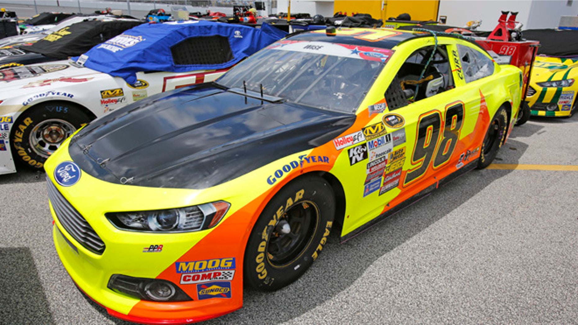 July 4, 2014: Josh Wise's car has a black-painted hood to cover a campaign ad for Florida Democratic gubernatorial candidate Charlie Crist before NASCAR Sprint Cup series qualifying at Daytona International Speedway in Daytona Beach, Fla. (AP)