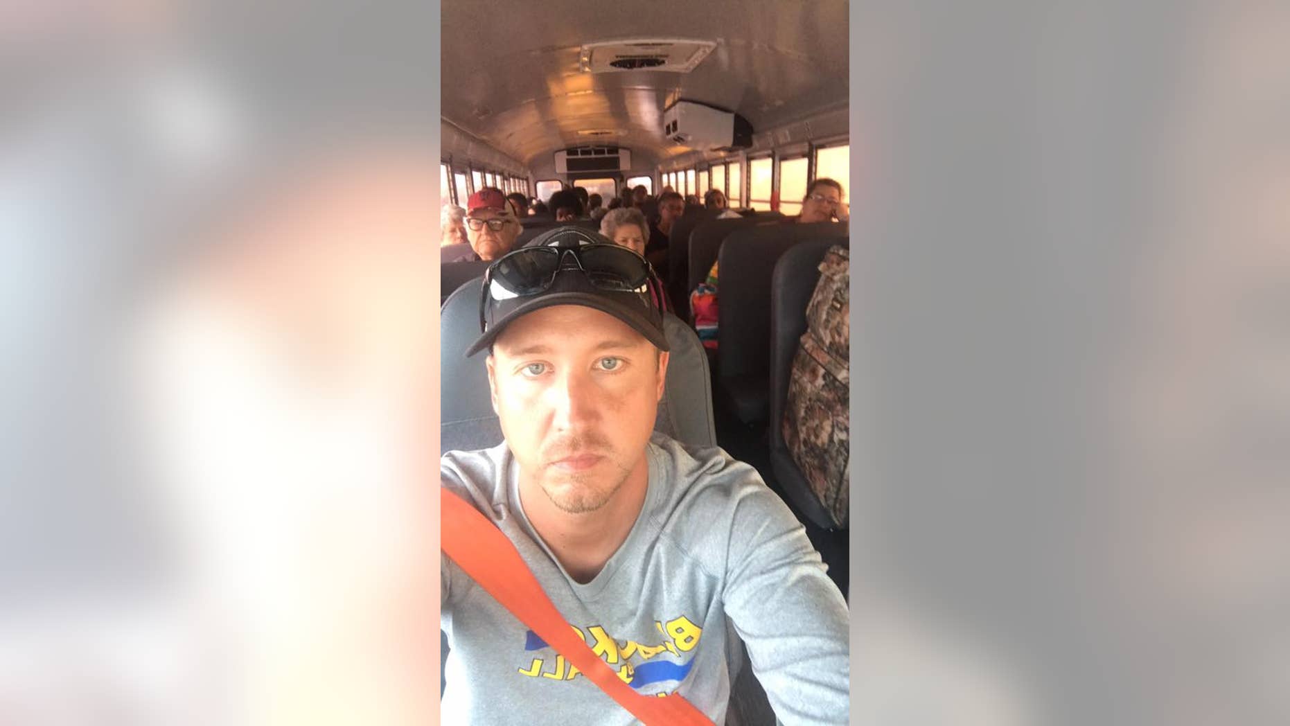 Nathan Janak, boys’ basketball coach at Bay City High School in Texas, rescued Harvey victims by bus.