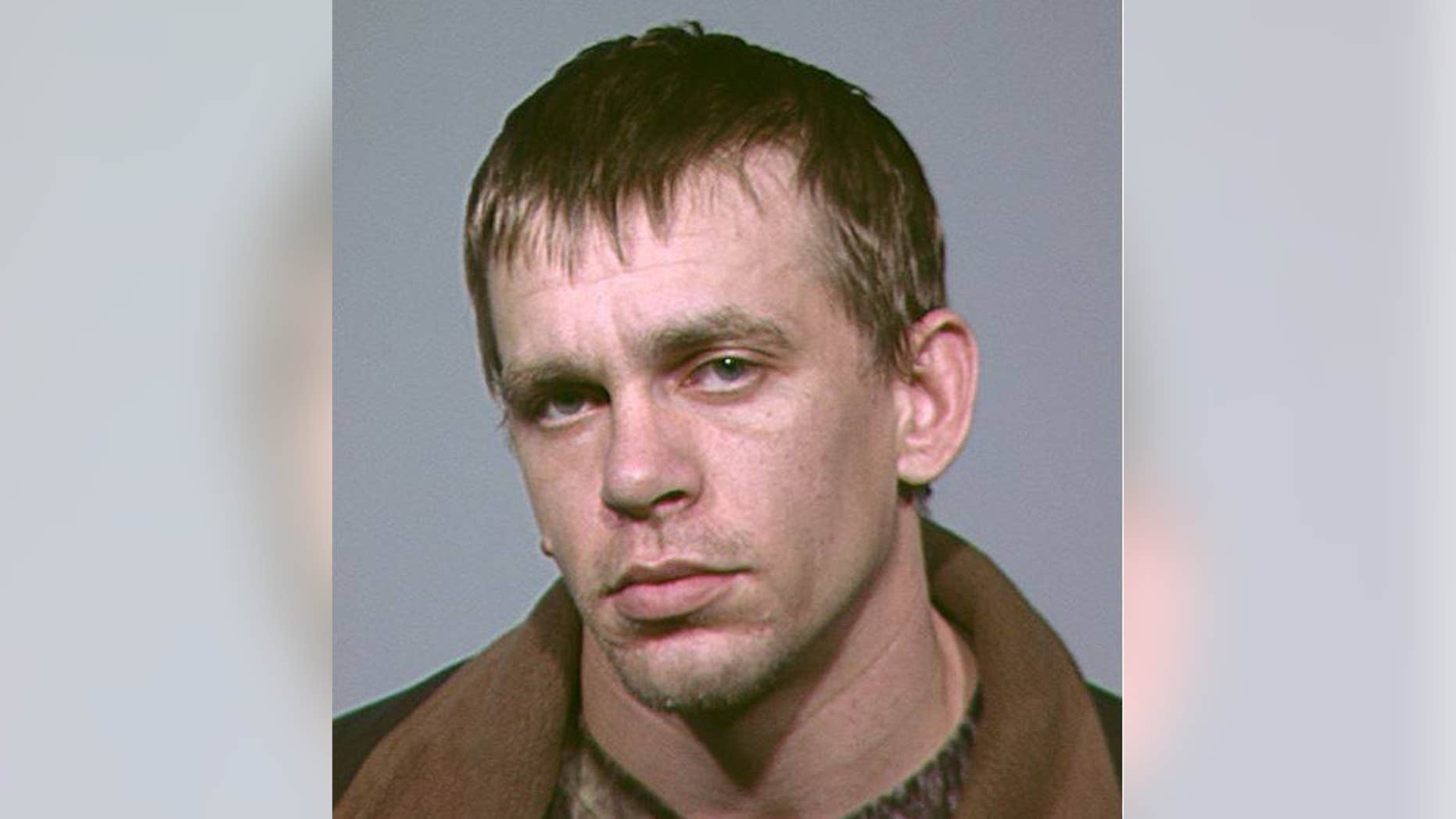 Nathan Alexander Wilson, 34, is suspected of killing his parents at their home on Monday morning.