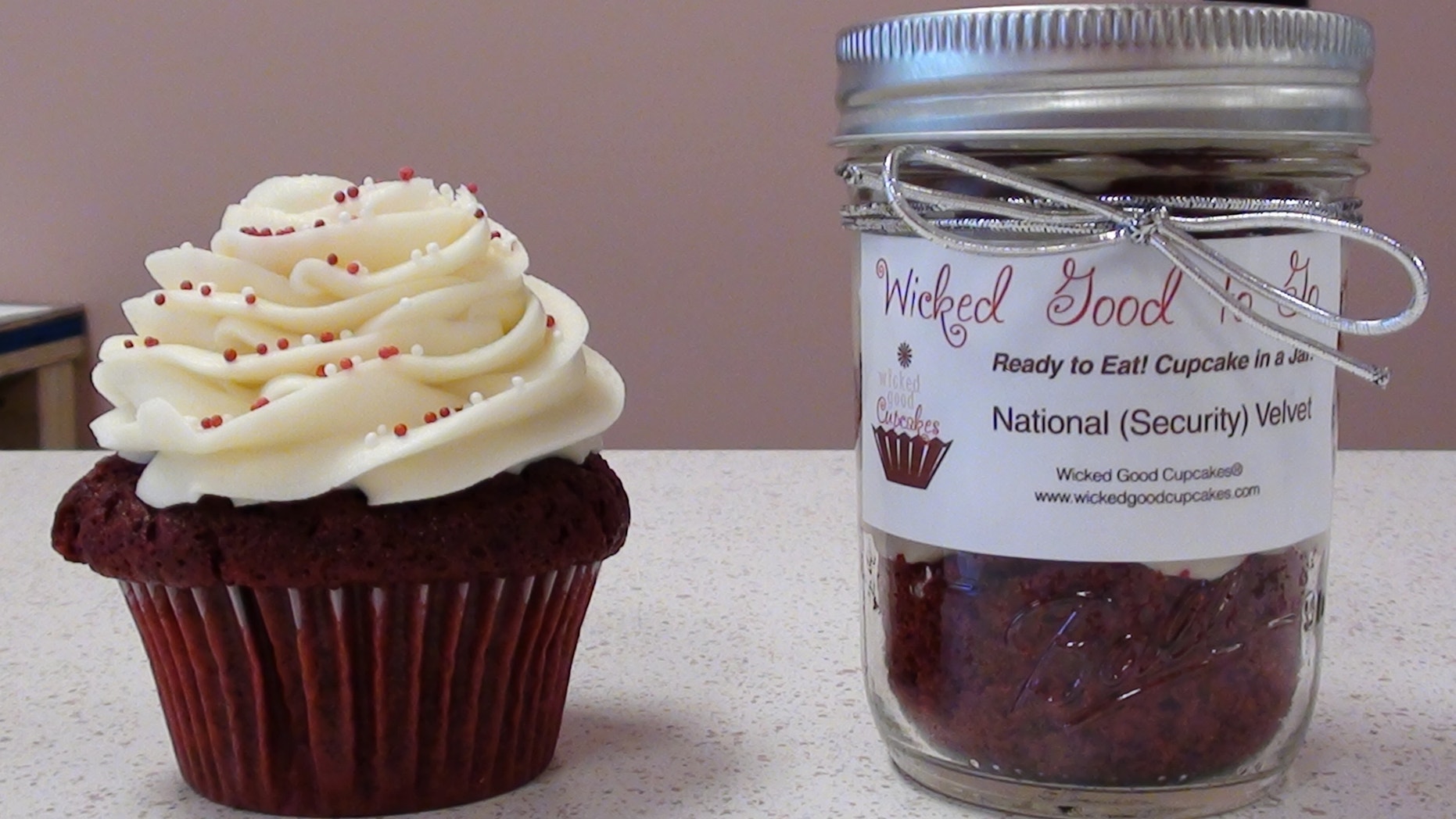 A red velvet cupcake along with the newly minted National (Security) Velvet from Wicked Good Cupcakes.