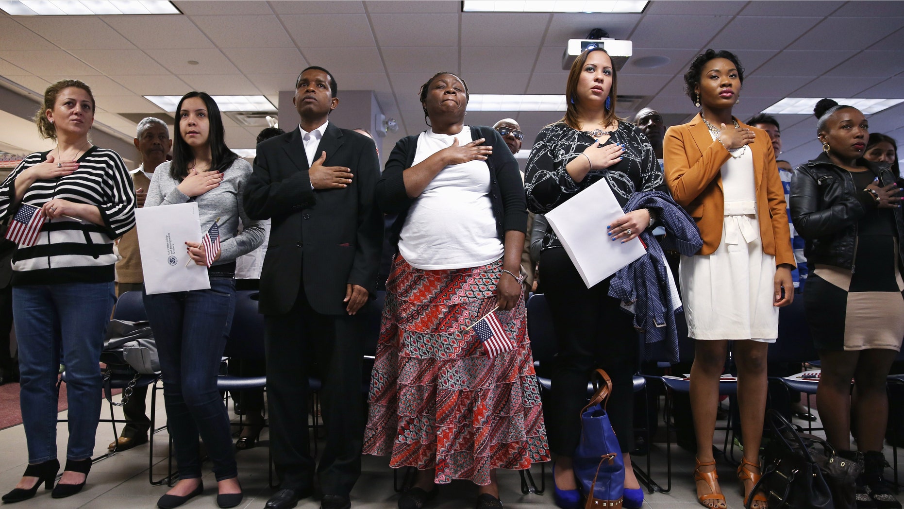 A naturalization ceremony at the U.S. Citizenship and Immigration Services (USCIS), office on May 17, 2013 in New York City.