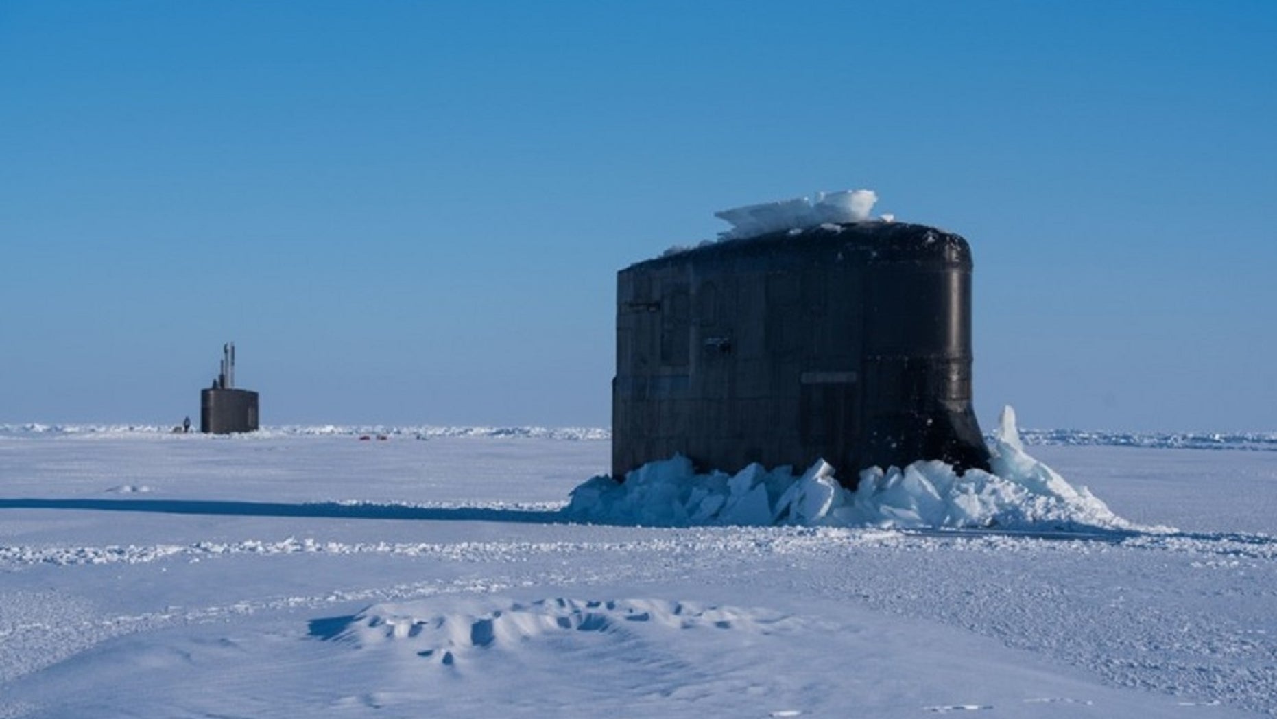 The submarine USS Connecticut and fast-attack submarine USS Hartford breakthrough the ice in support of Ice Exercise 2018 near Ice Camp Skate in the Arctic Circle, March 10, 2018.