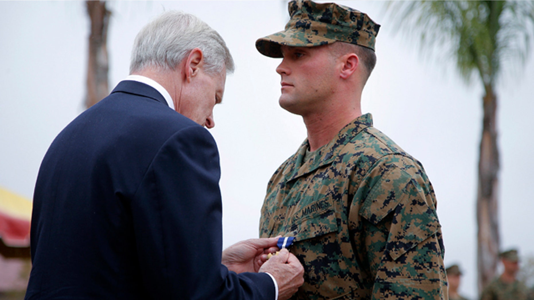 Dec. 3, 2012: U.S. Marine Sgt. William Soutra Jr., right, receives the Navy Cross from Secretary of the Navy Ray Mabus during a ceremony held at Camp Pendleton, Calif.