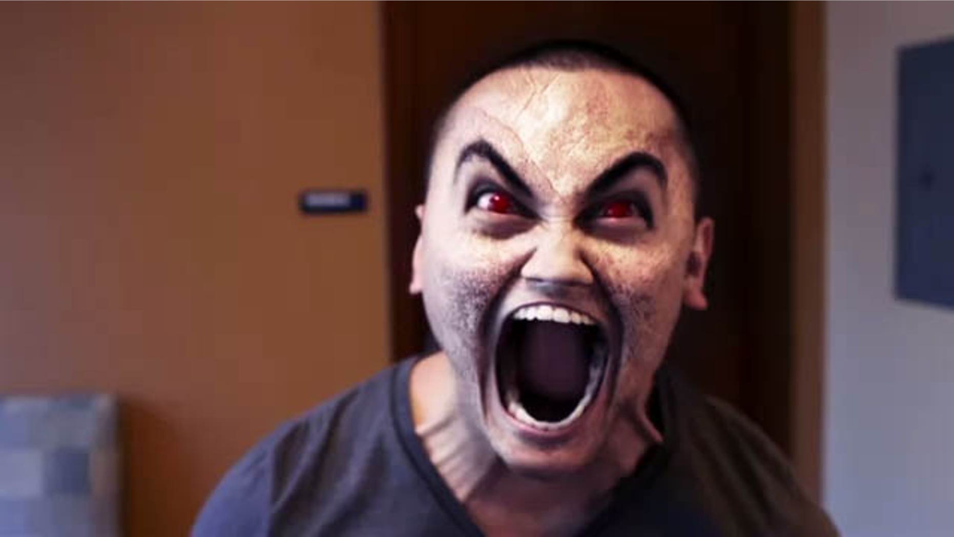 This is a screen shot of a scene in the video when the service member, under the influence of bath salts, returns to his dorm room and believes his roommate has turned demonic.