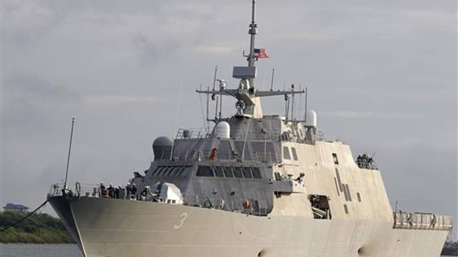 In this Sept. 17, 2012, file photo, the littoral combat ship USS Forth Worth arrives at the port of Galveston, Texas, to prepare for its formal commissioning ceremony.