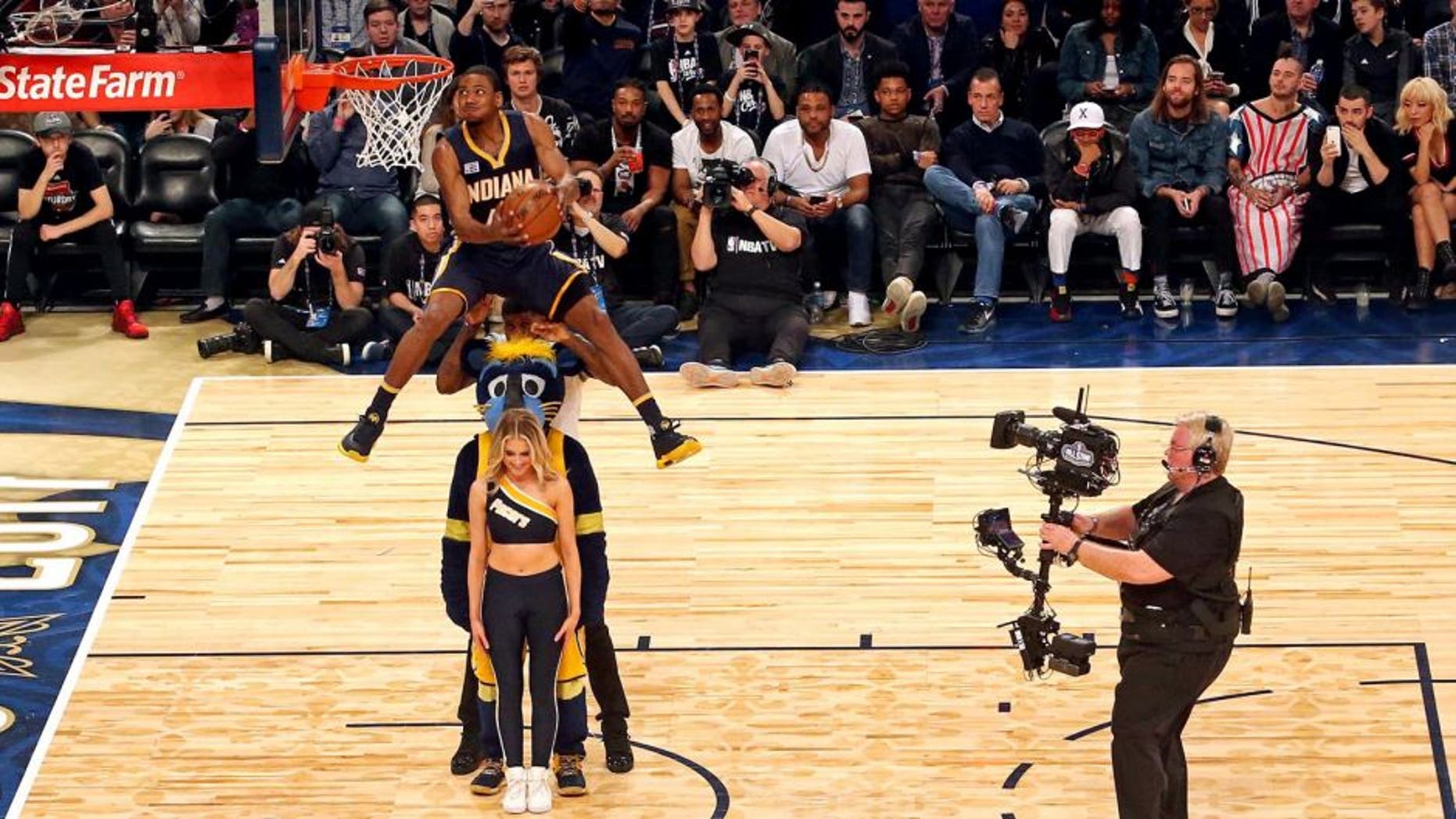 Feb 18, 2017; New Orleans, LA, USA; Indiana Pacers forward Glenn Robinson III (40) makes the winning dunk in the slam dunk contest during NBA All-Star Saturday Night at Smoothie King Center. Mandatory Credit: Bob Donnan-USA TODAY Sports