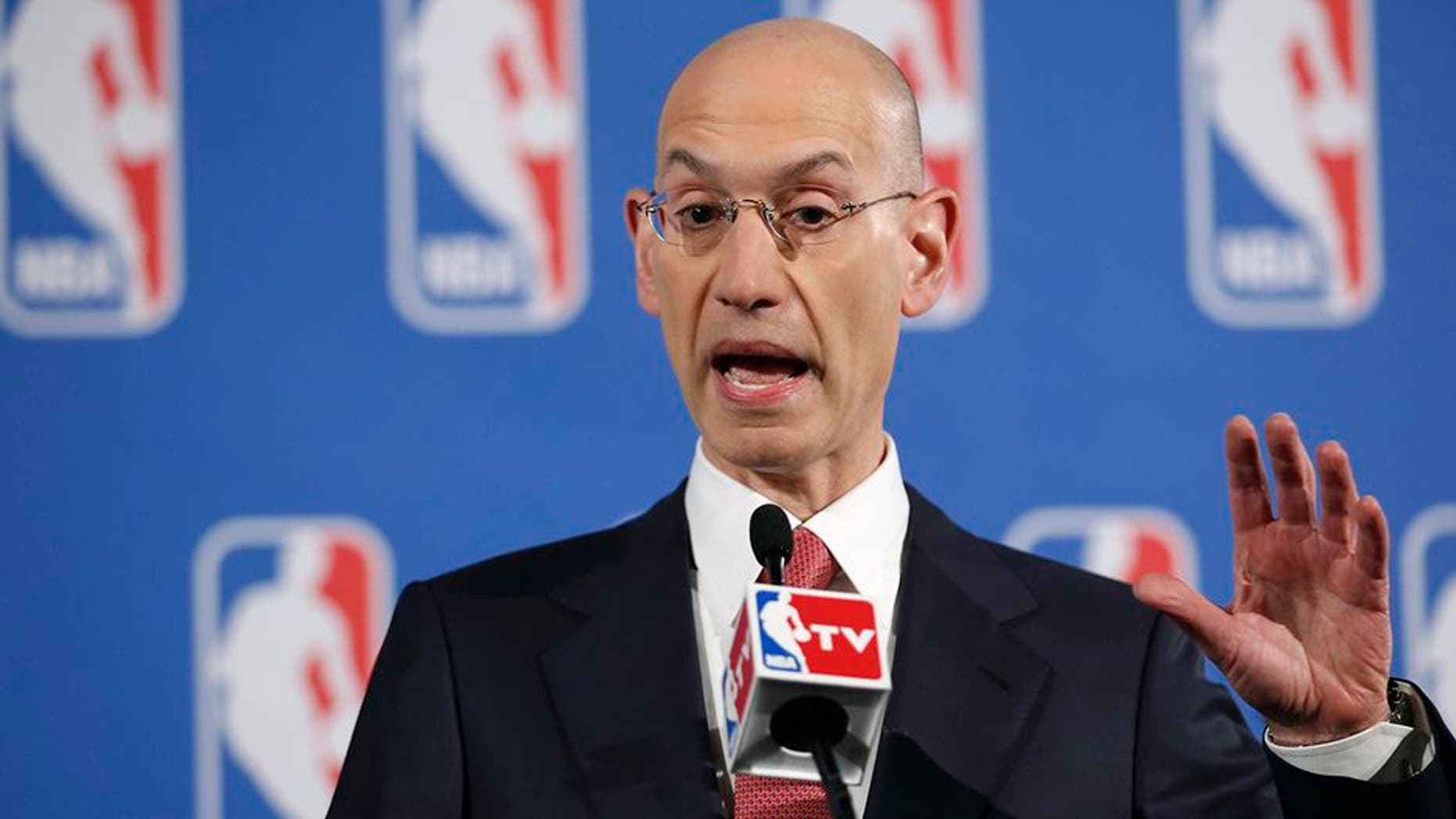 FILE - In this May 20, 2014, file photo, NBA Commissioner Adam Silver gestures during a press conference before the NBA draft lottery in New York. Thanks to a $24 billion television deal that kicks in before the 2016-17 season, already skyrocketing salaries will soon reach a new stratosphere. (AP Photo/Kathy Willens, File)