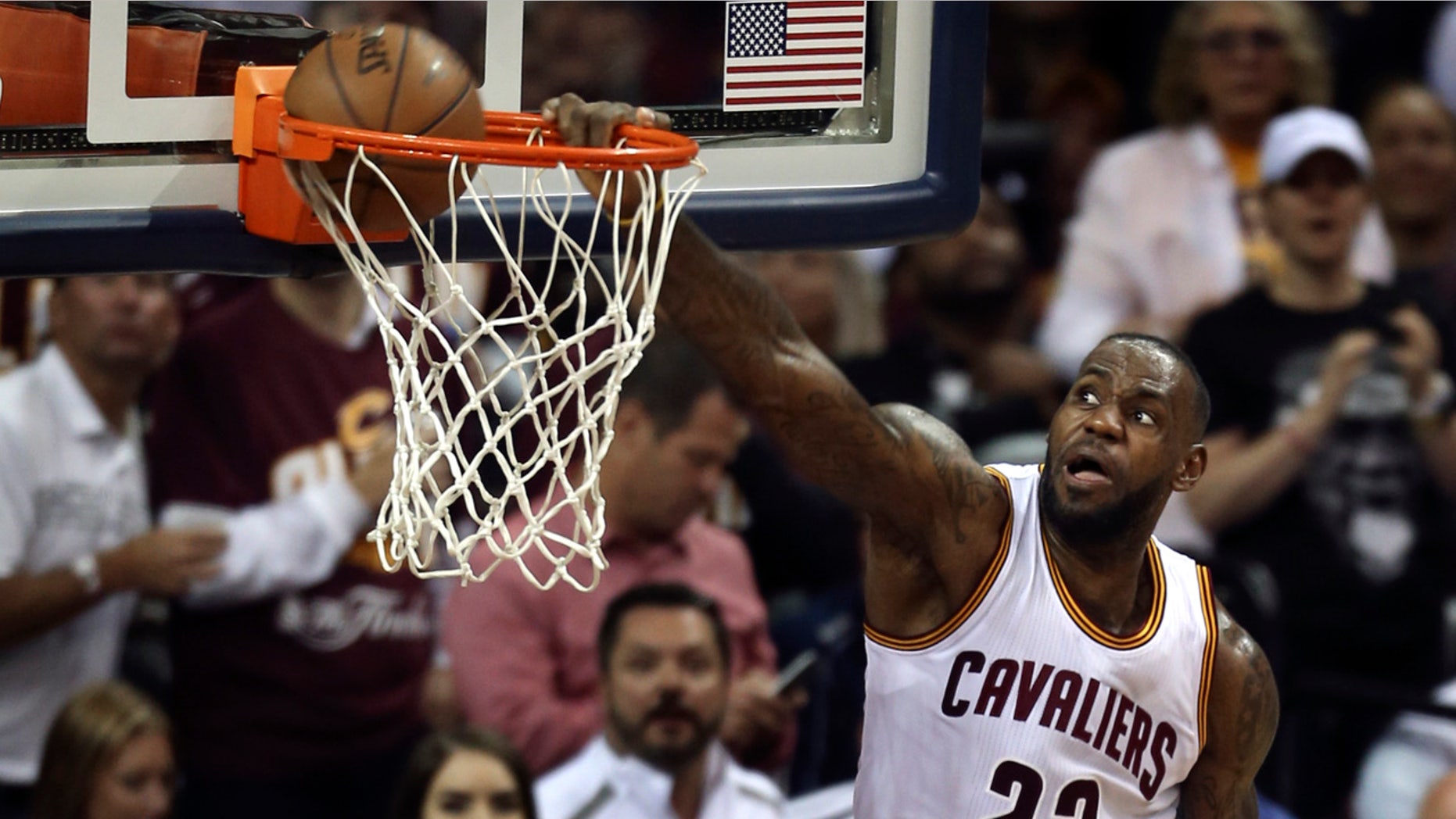 June 8, 2016: Cleveland Cavaliers forward LeBron James dunks against the Golden State Warriors during the second half of Game 3 of the NBA Finals in Cleveland.