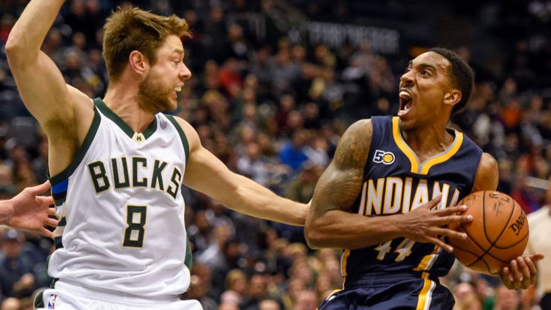 Nov 3, 2016; Milwaukee, WI, USA; Indiana Pacers guard Jeff Teague (44) looks to shoot against Milwaukee Bucks guard Matthew Dellavedova (8) in the second quarter at BMO Harris Bradley Center. Mandatory Credit: Benny Sieu-USA TODAY Sports