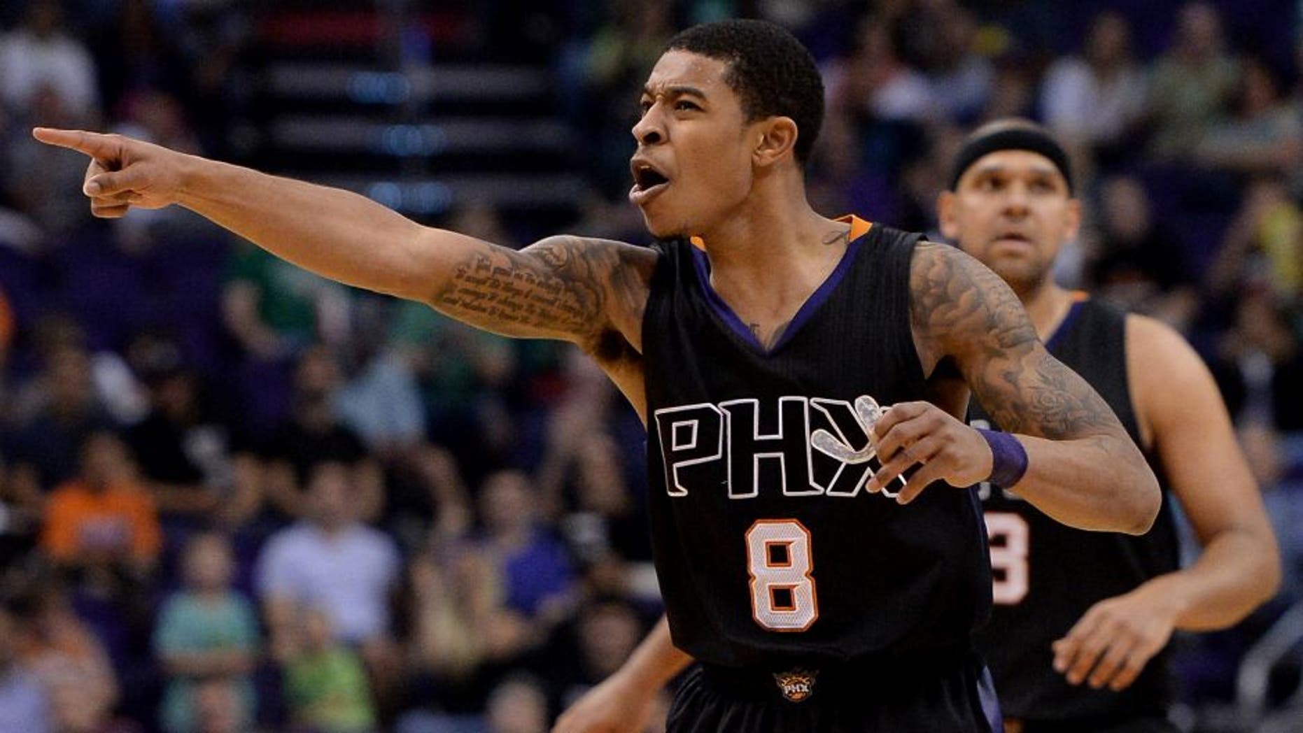 Mar 17, 2017; Phoenix, AZ, USA; Phoenix Suns guard Tyler Ulis (8) reacts on the court in the second half against the Orlando Magic at Talking Stick Resort Arena. The Magic won 109-103. Mandatory Credit: Jennifer Stewart-USA TODAY Sports