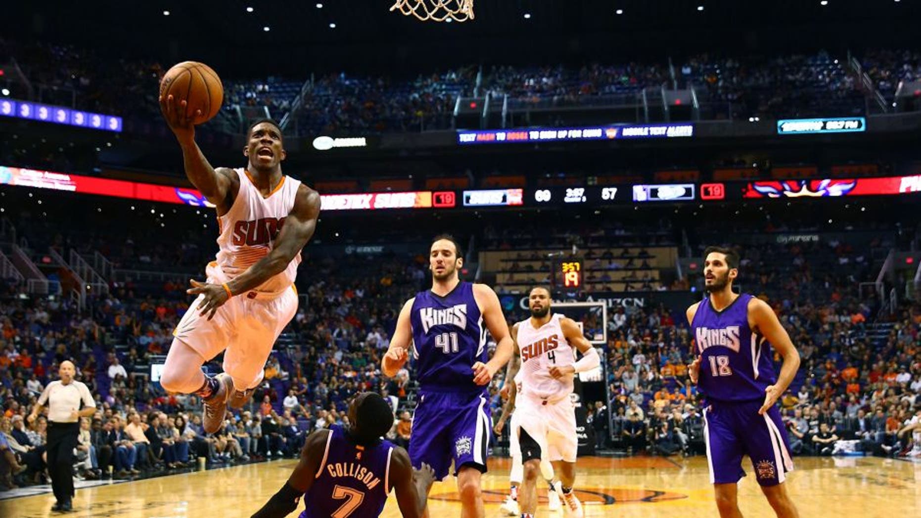Nov 4, 2015; Phoenix, AZ, USA; Phoenix Suns guard Eric Bledsoe (2) drives to the basket in the second half against Sacramento Kings guard Darren Collison (7) at Talking Stick Resort Arena. The Suns defeated the Kings 118-97. Mandatory Credit: Mark J. Rebilas-USA TODAY Sports