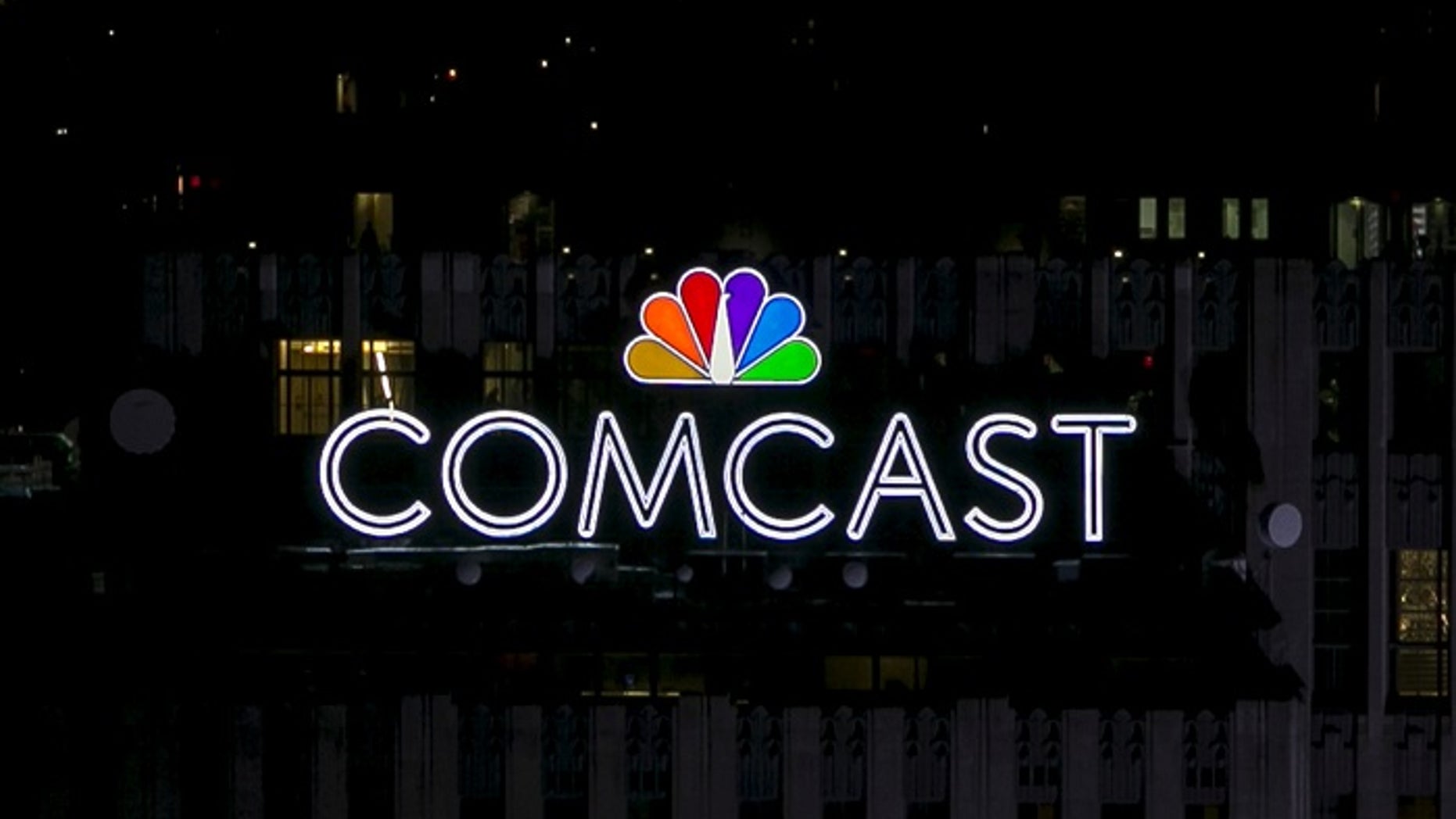 File photo - The NBC and Comcast logo are displayed on top of 30 Rockefeller Plaza in midtown Manhattan in New York July 1, 2015. (REUTERS/Brendan McDermid/File Photo)