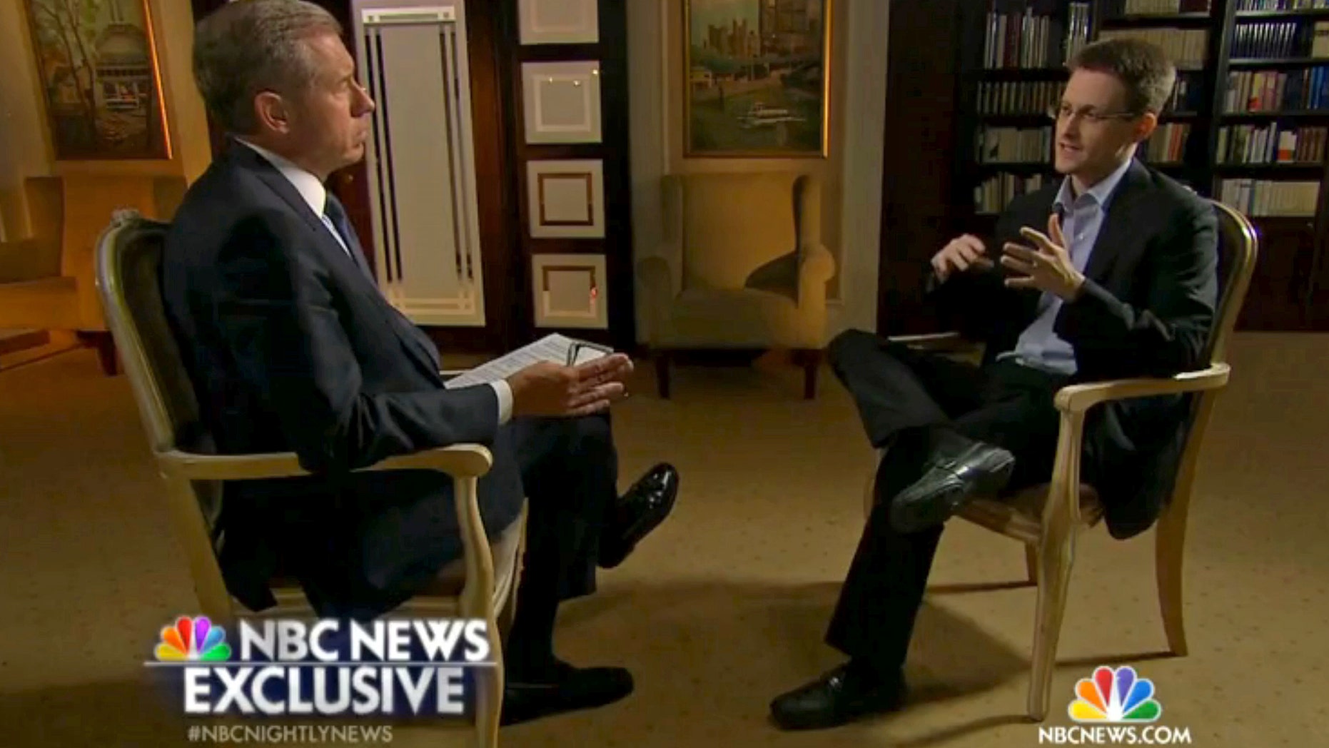 May 27, 2014: Edward Snowden, a former National Security Agency (NSA) contractor, right, speaks to NBC News anchor Brian Williams, left, during an NBC Exclusive interview.