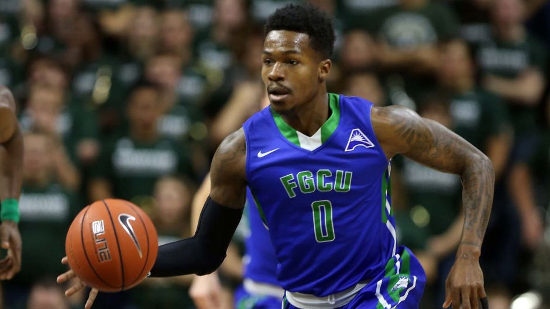 Nov 20, 2016; East Lansing, MI, USA; Florida Gulf Coast Eagles guard Brandon Goodwin (0) brings the ball up court against the Michigan State Spartans during the first half of a game at Jack Breslin Student Events Center. Mandatory Credit: Mike Carter-USA TODAY Sports