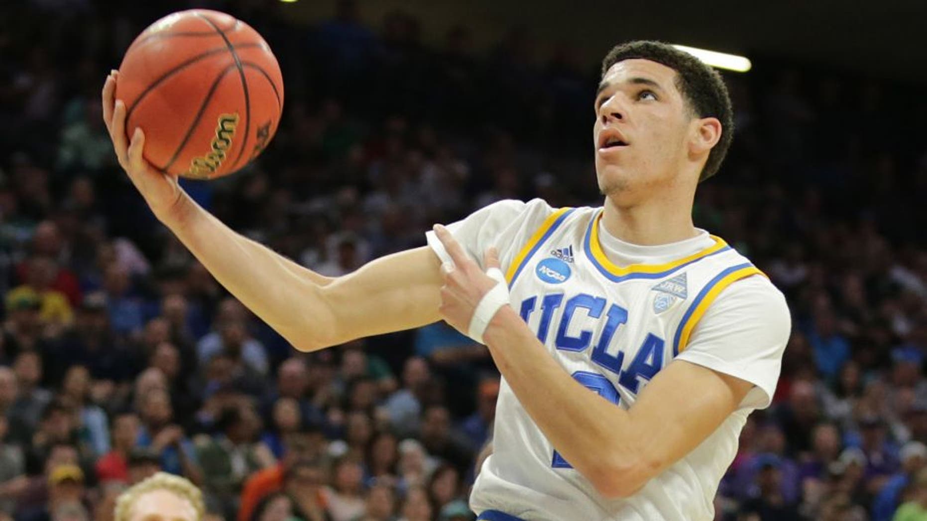 Mar 17, 2017; Sacramento, CA, USA; UCLA Bruins guard Lonzo Ball (2) prepares to shoot the ball against the Kent State Golden Flashes in the first round of the 2017 NCAA Tournament at Golden 1 Center. Mandatory Credit: Kelley L Cox-USA TODAY Sports
