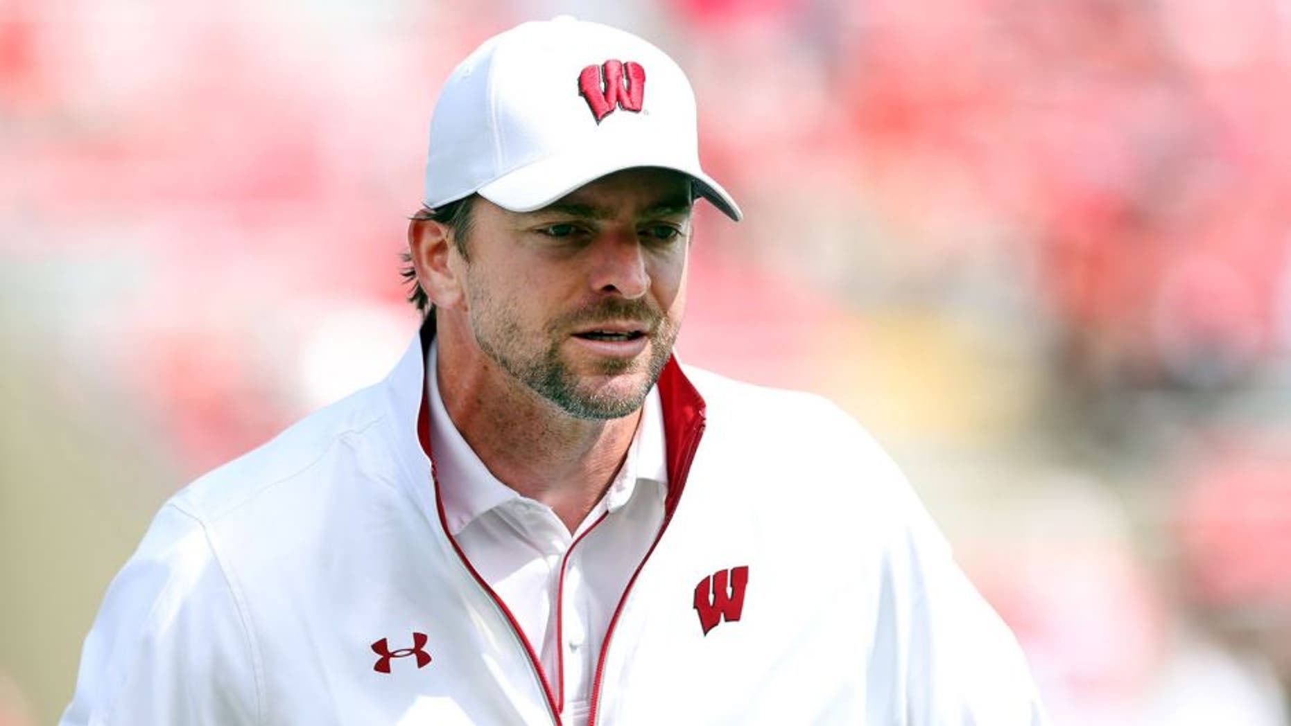 Sep 10, 2016; Madison, WI, USA; Wisconsin Badgers defensive coordinator Justin Wilcox watches his squad practice before the game with the Akron Zips at Camp Randall Stadium. Wisconsin defeated Akron 54-10. Mandatory Credit: Mary Langenfeld-USA TODAY Sports