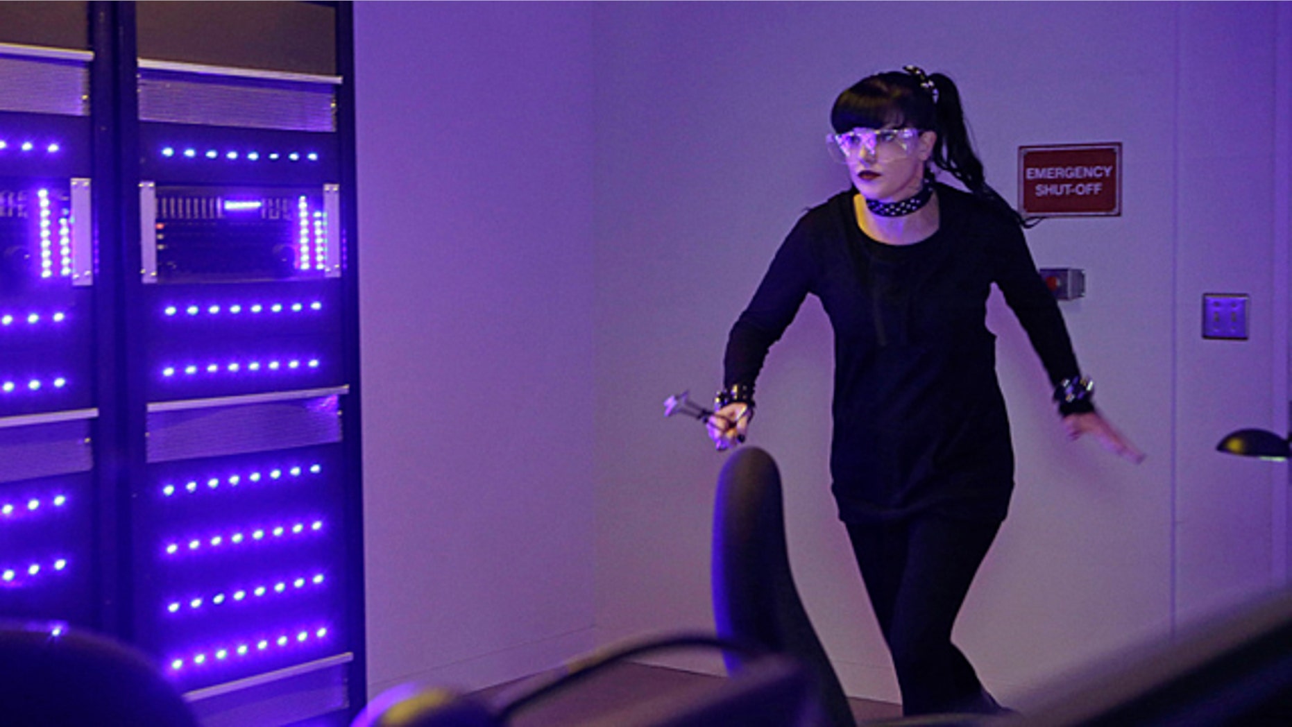 Oct. 20, 2015: While visiting a pharmaceutical lab on a murder case, Abby (Pauley Perrette) is trapped with no communication to the outside world after armed men take over the building and hold everyone hostage, on 'NCIS.' (Sonja Flemming/CBS)