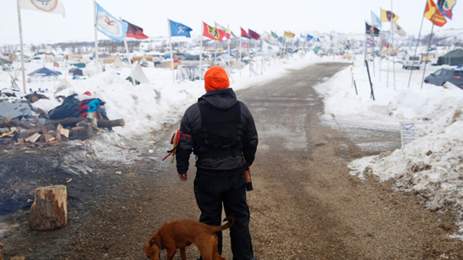 A security volunteer stands in the Dakota Access Pipeline protest camp near Cannon Ball, North Dakota, U.S., January 24, 2017.