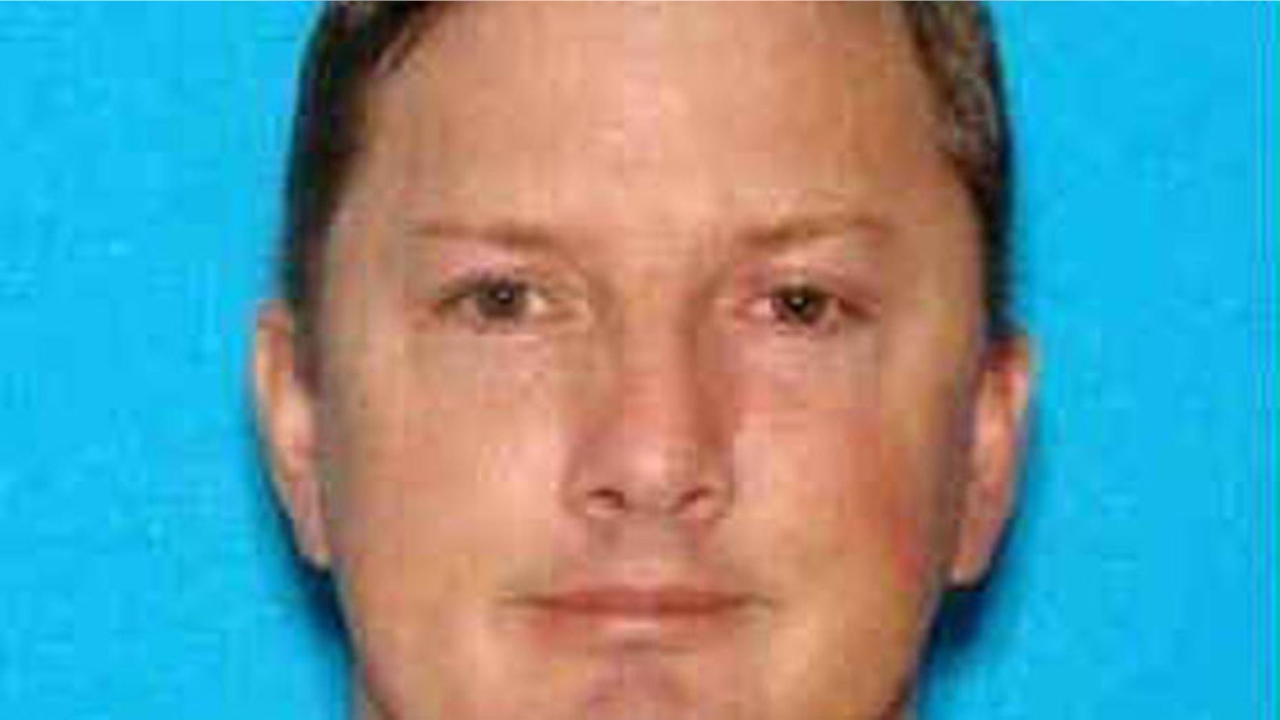 Neal Falls was shot as he attacked an escort, cops say.