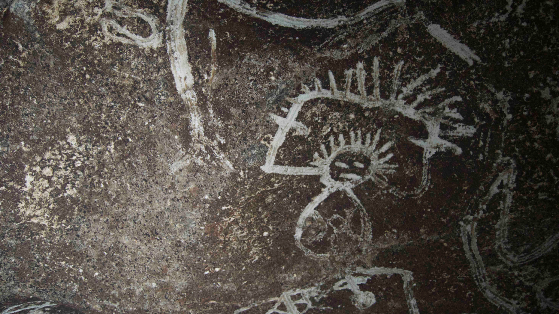 A depiction of a man rubbed into a Mona Island cave wall at least 500 years ago.