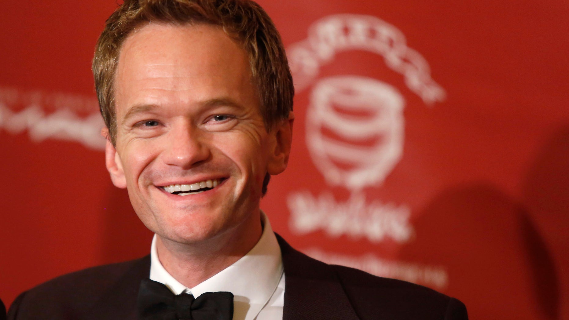 February 7, 2014. Actor Neil Patrick Harris meets the media after he was honored as Hasty Pudding Theatricals " Man of the Year" during a roast at Harvard University in Cambridge, Massachusetts.