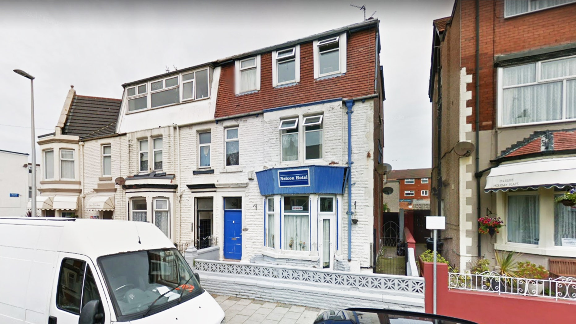 After leaving a bad review for the Nelcon Hotel in England, a woman claims she received a rude text from the owner.