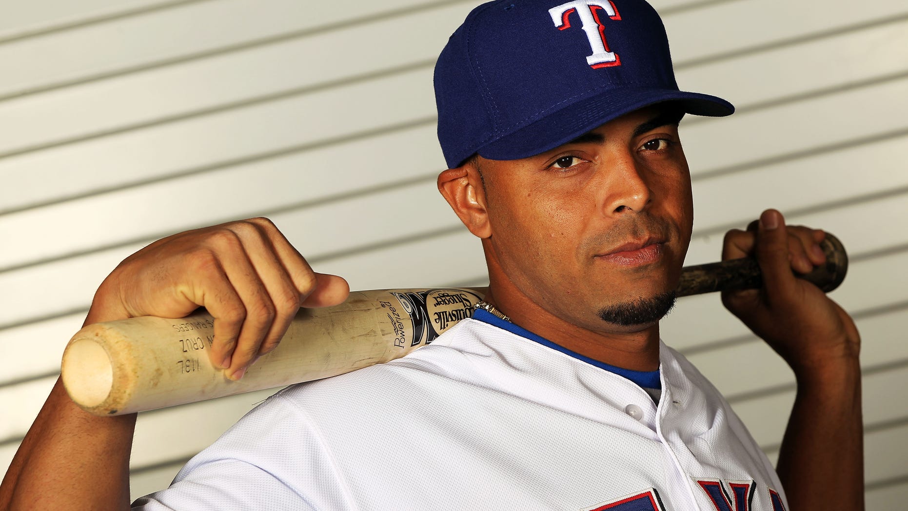 SURPRISE, AZ - FEBRUARY 28: Nelson Cruz #17 of the Texas Rangers poses during spring training photo day on February 28, 2012 in Surprise, Arizona. (Photo by Jamie Squire/Getty Images)