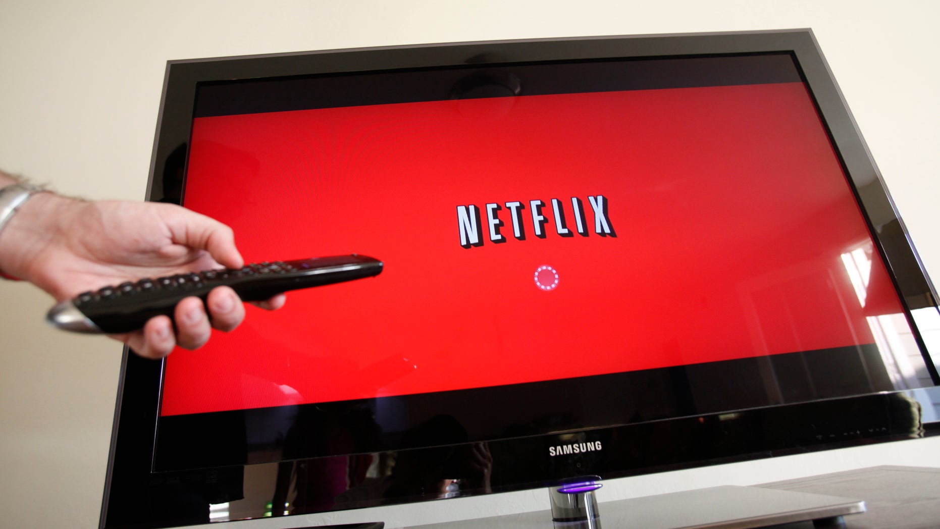 July 20, 2010. A person uses Netflix in Palo Alto, Calif. Netflix is tapping into six new markets on Monday hoping to gain hundred thousand new subscribers and balance out the billions spent on entertainment content each year. Their presence is welcome in most European countries, but in France Netflix is facing government-imposed regulatory hurdles and pressure from established local competitors.
