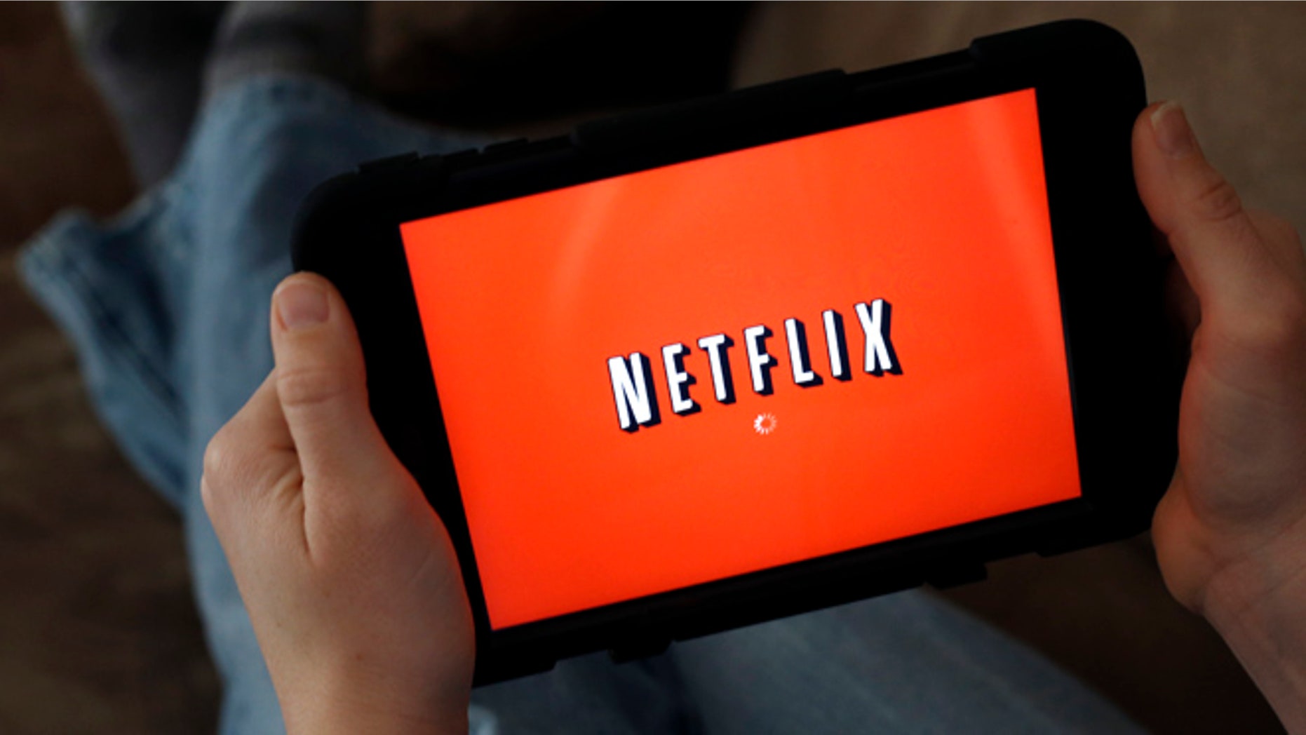 Jan. 17, 2014: A person displays Netflix on a tablet in North Andover, Mass.