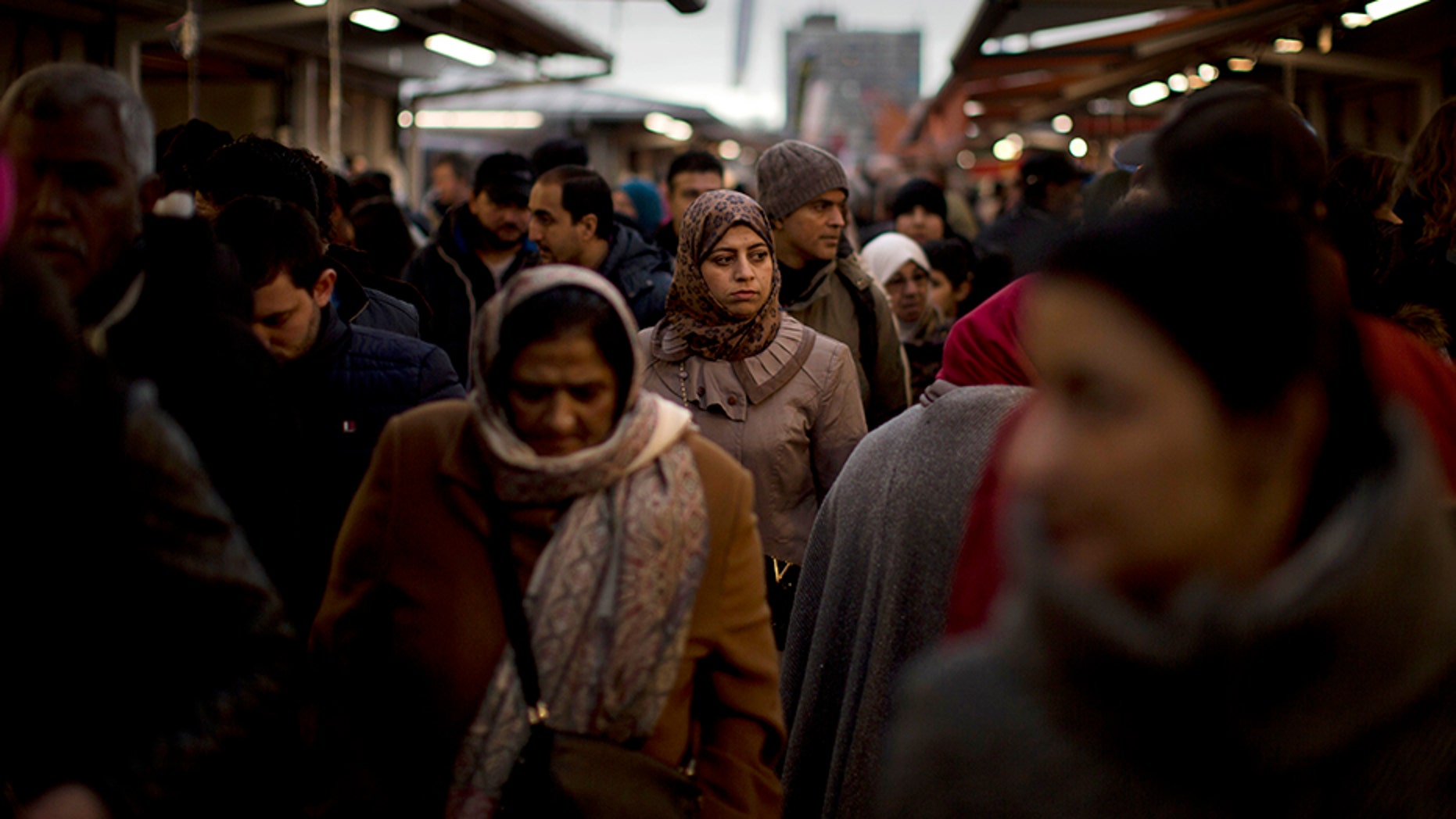 March 4, 2017: People walk along street stalls at a fruit market in The Hague, The Netherlands.