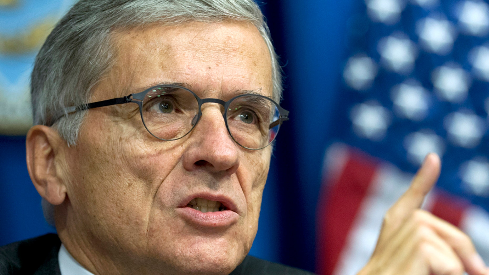FILE - In this Oct. 8, 2014 file photo, Federal Communications Commission (FCC) Chairman Tom Wheeler speaks during new conference in Washington.