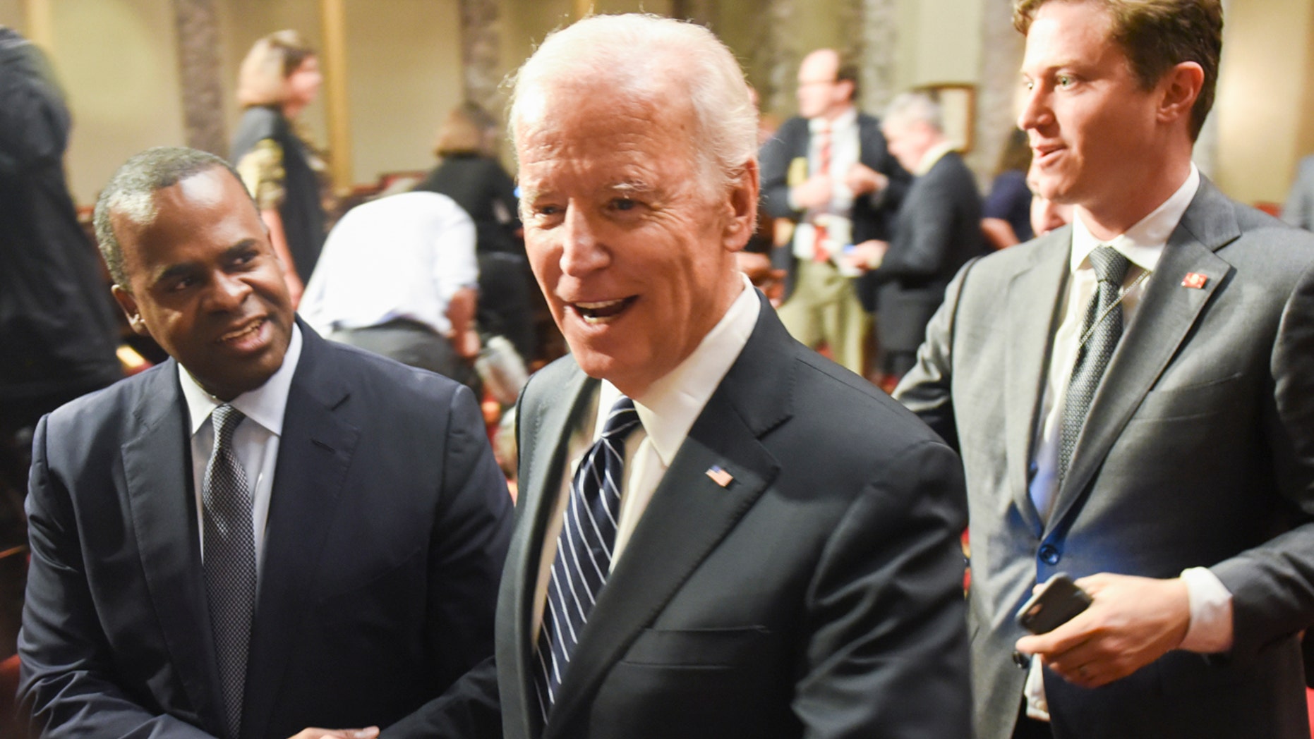 Vice President Joe Biden leaves the the Old Senate Chamber following a mock swearing in ceremony on Capitol Hill in Washington, Tuesday, Jan. 3, 2017, as the 115th Congress begins. (AP Photo/Kevin Wolf)