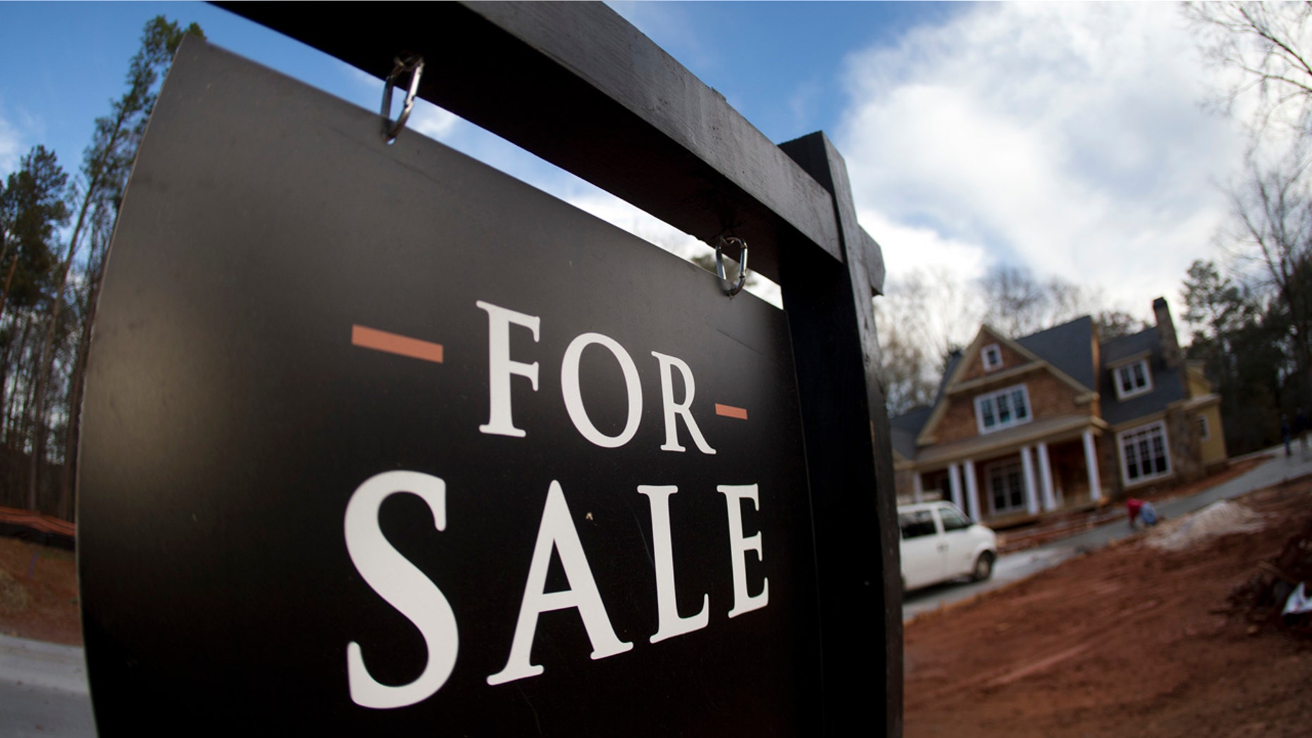 A South Carolina woman was shocked to find another family living in her newly purchased home after returning from vacation.