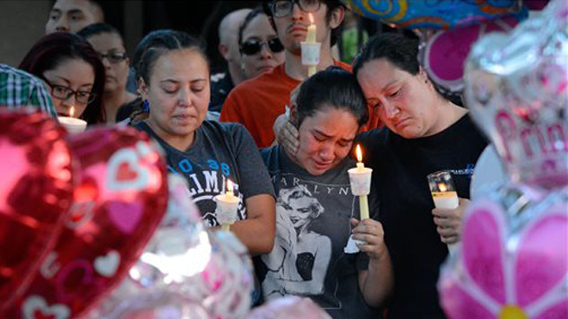 A candlelight vigil for 10-year-old Victoria Martens on Aug. 25, 2016, in Albuquerque, N.M.
