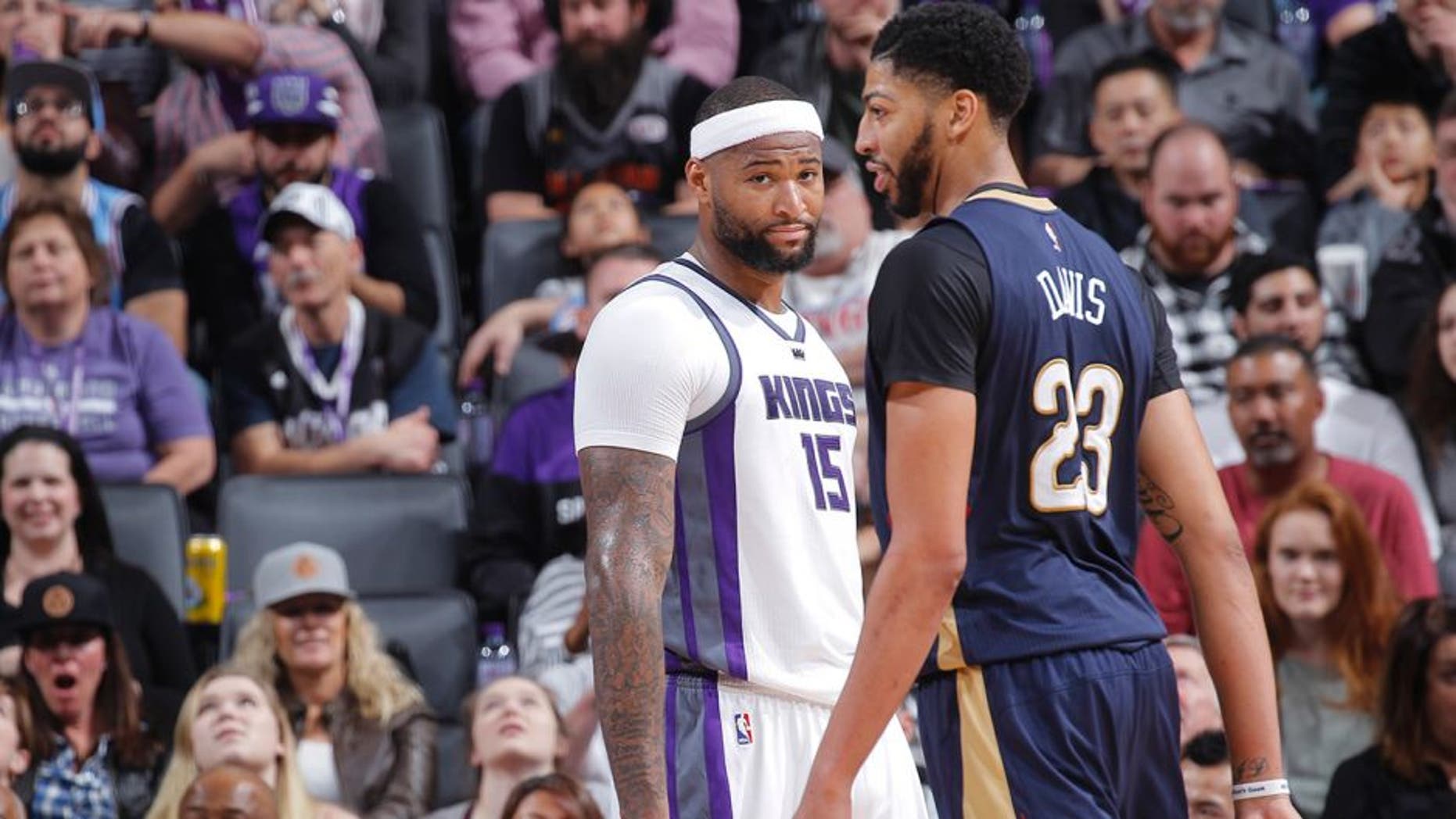 SACRAMENTO, CA - FEBRUARY 12: DeMarcus Cousins #15 of the Sacramento Kings looks over at Anthony Davis #23 of the New Orleans Pelicans on February 12, 2017 at Golden 1 Center in Sacramento, California. NOTE TO USER: User expressly acknowledges and agrees that, by downloading and or using this photograph, User is consenting to the terms and conditions of the Getty Images Agreement. Mandatory Copyright Notice: Copyright 2017 NBAE (Photo by Rocky Widner/NBAE via Getty Images)