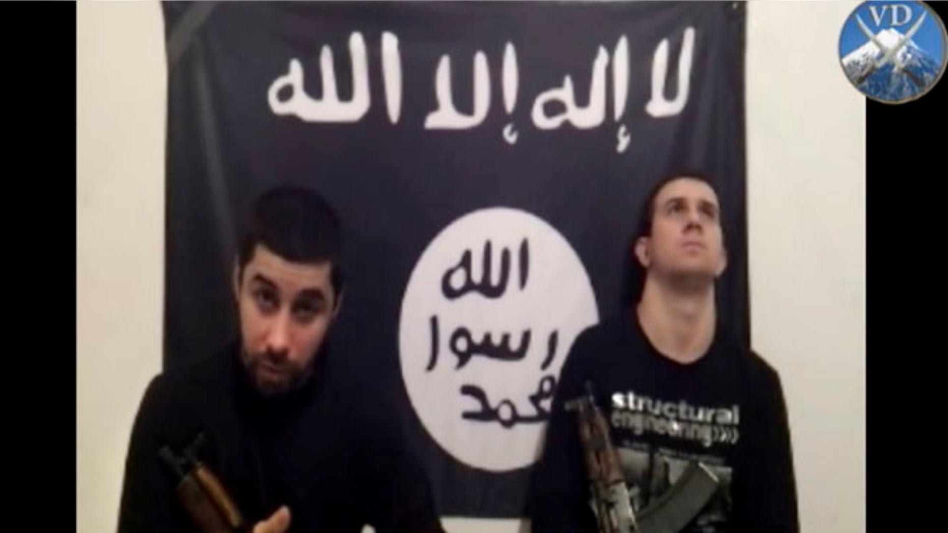 In this image made from a video posted online Sunday, Jan. 19, 2014 by an Islamic militant group asserting responsibility for suicide bombings last month that killed 34 people in Volgograd, Russia, two men, identified as Suleiman and Abdurakhman and who purportedly carried out the twin suicide bombings are seen at an unknown location.
