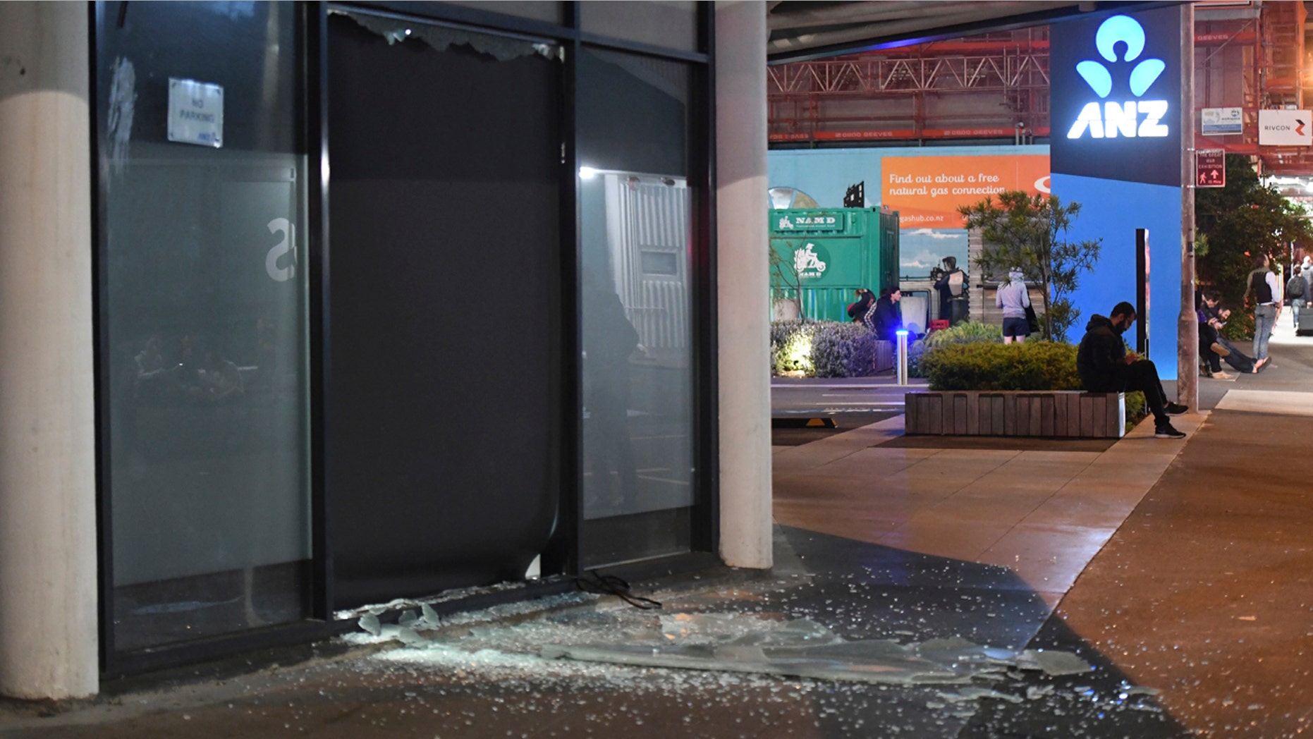 A broken window is seen in Tory Street after people were evacuated from the building in Wellington, New Zealand after an earthquake shook the capital.
