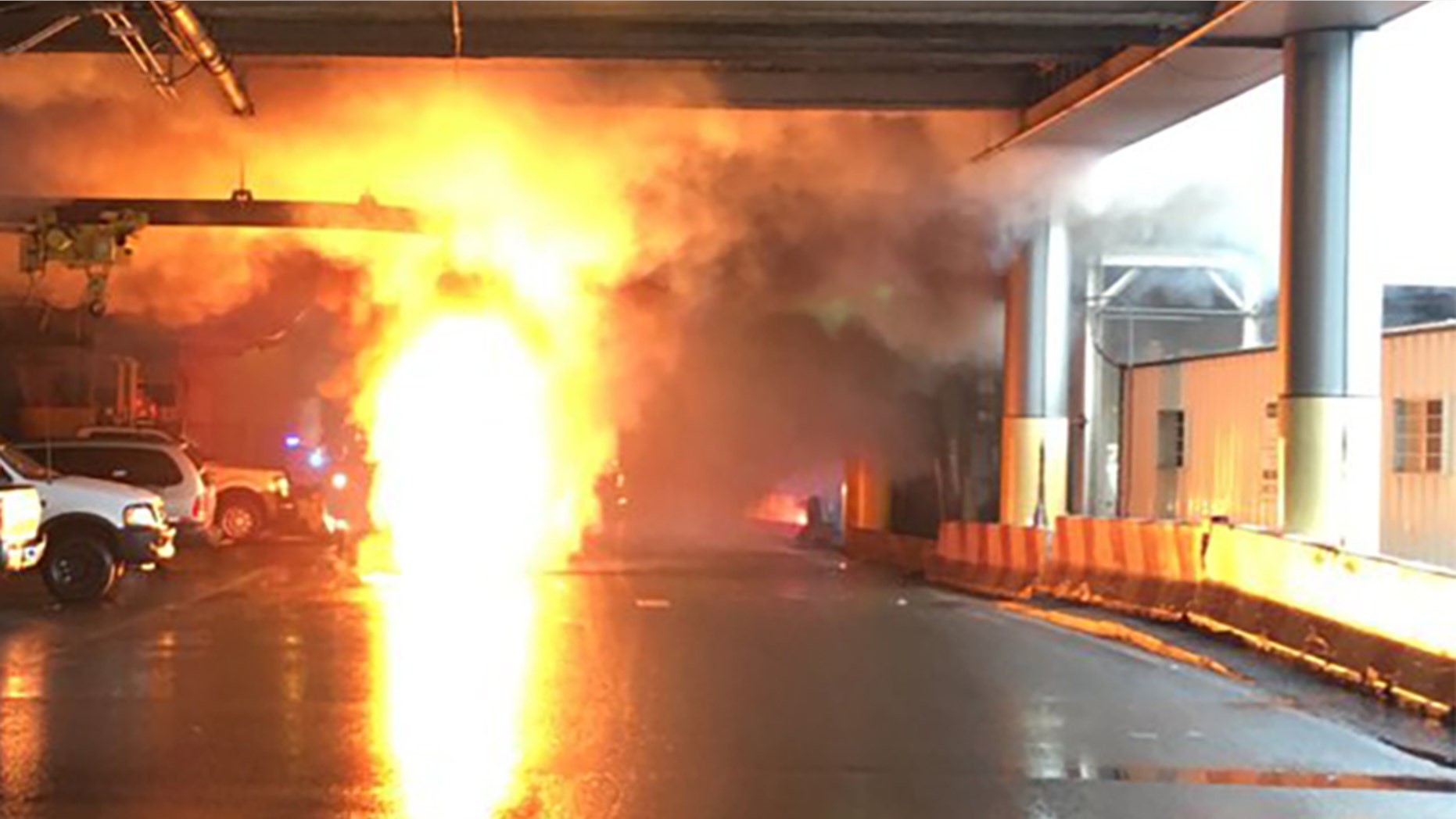 A transformer fire broke out in a manhole at New Jersey's Newark Airport, leading to a partial evacuation.