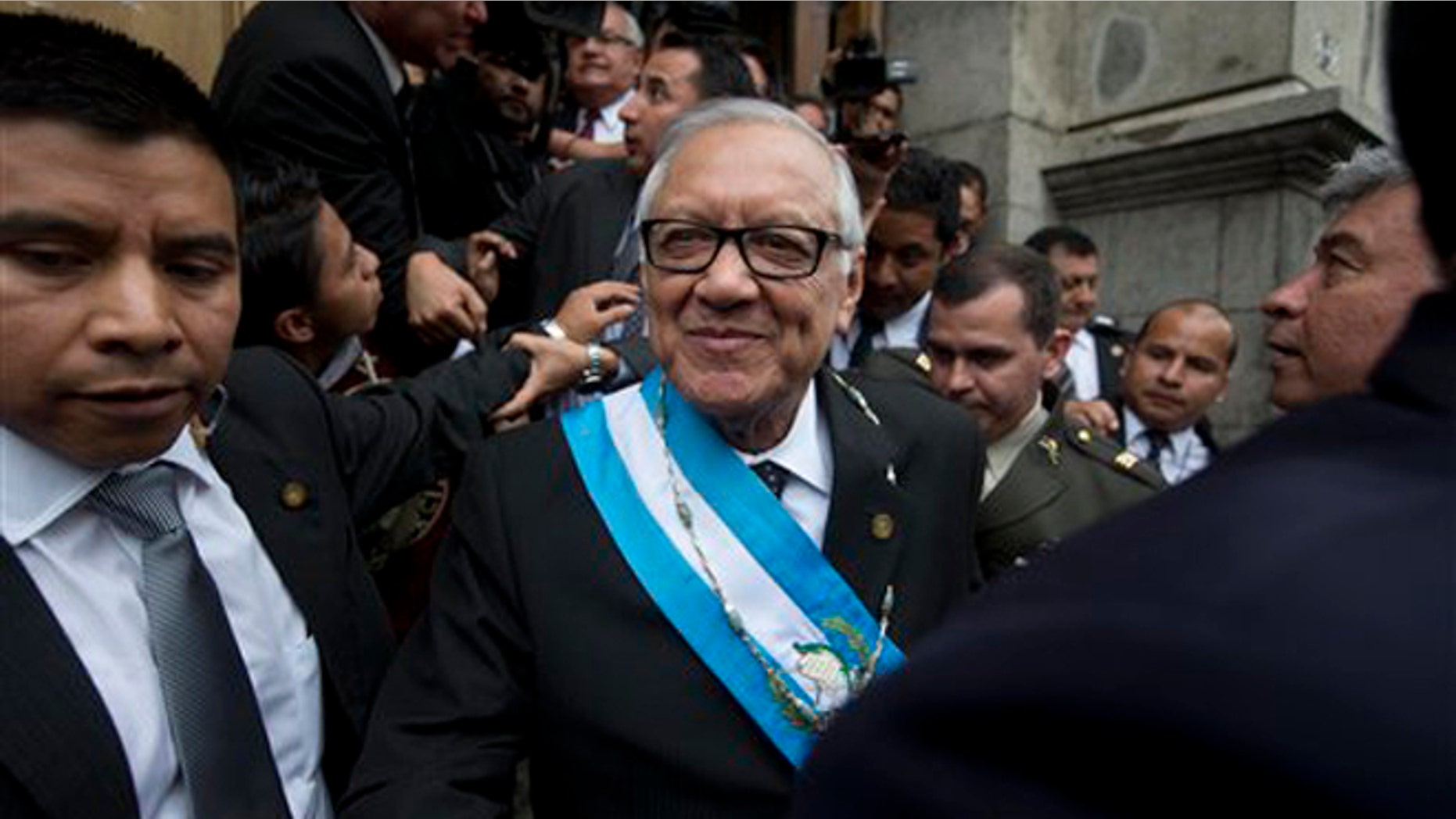 Sept. 3, 2015: Guatemala's new President Alejandro Maldonado leaves the Congress building after his swearing-in ceremony in Guatemala City.