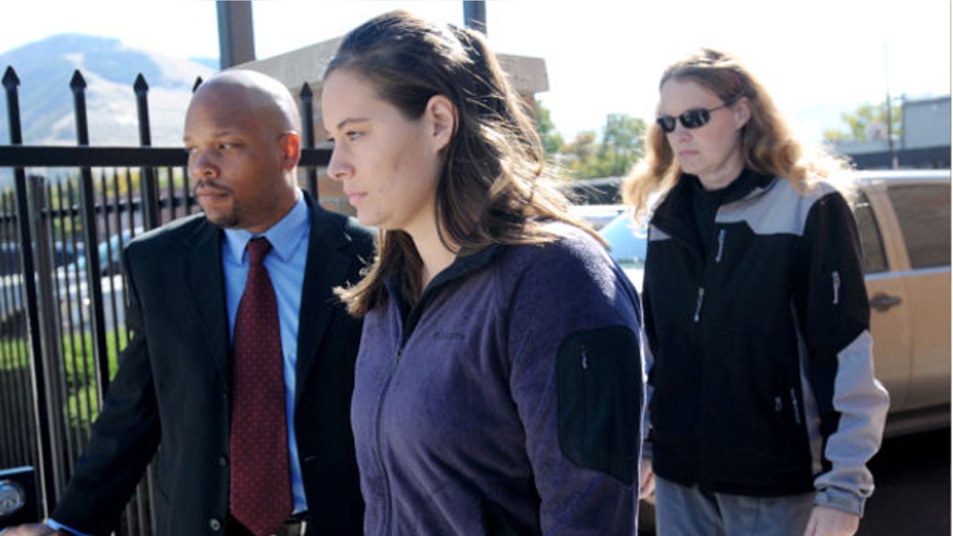 Oct. 4, 2013: Jordan Linn Graham, center, leaves the federal courthouse in Missoula, Mont. Graham, a newlywed bride accused of pushing her husband off a cliff to his death in Glacier National Park.