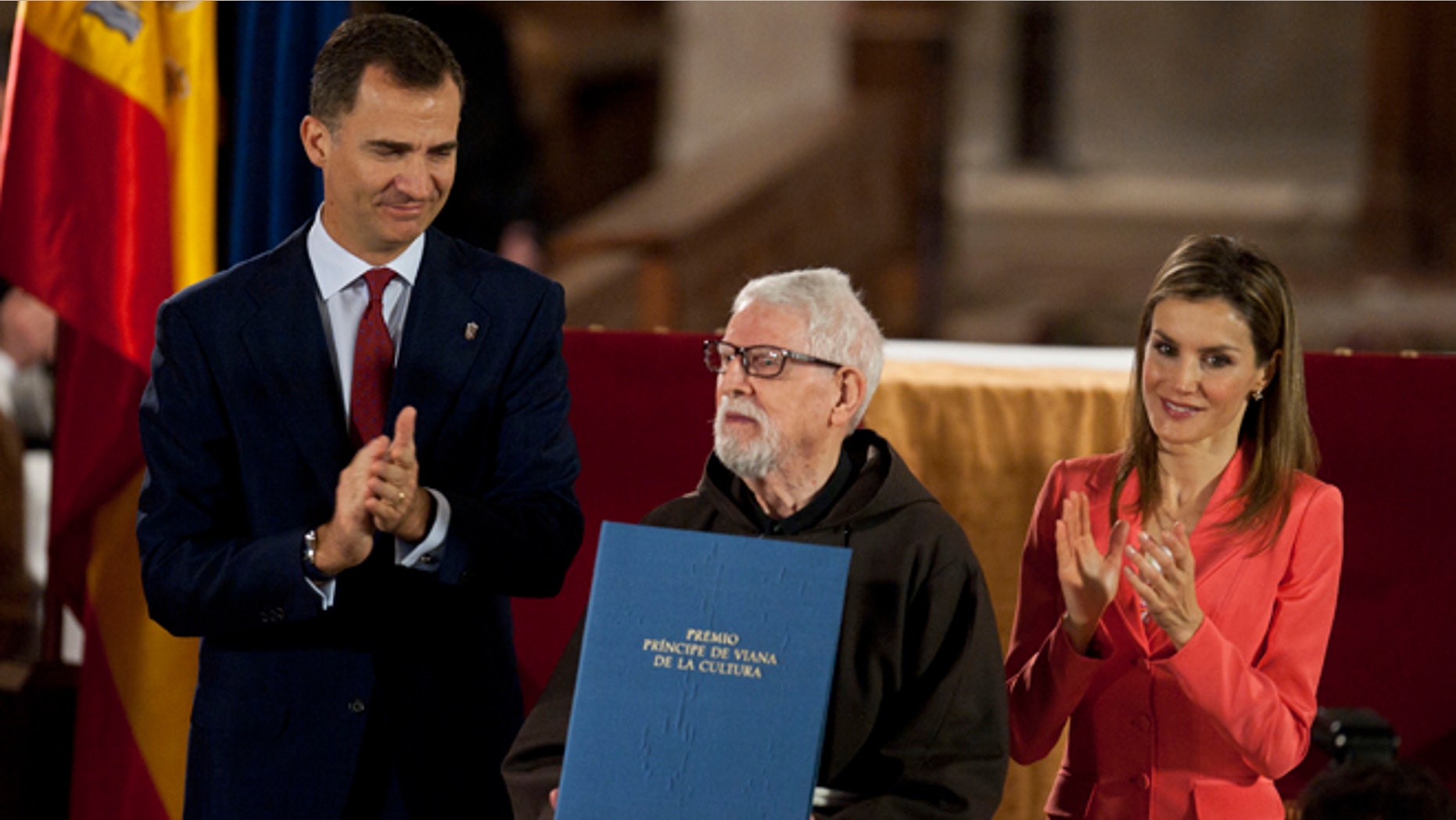 June 4, 2014: Historian Capuchino,Tarsicio de Azcona, center, receives the Prince's Viana Award, from Spain's Prince Felipe at the Monastery of Leyre, 40 miles from Pamplona, northern Spain. (AP)