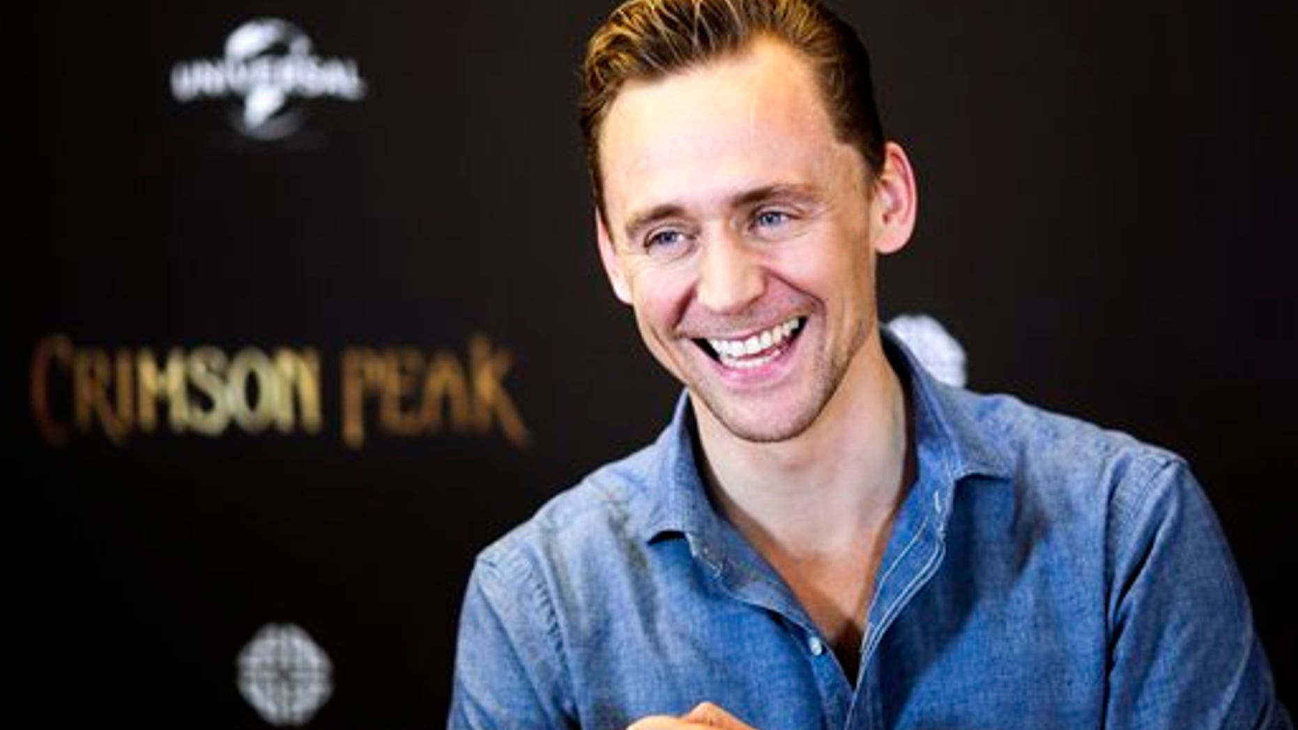 Actor Tom Hiddleston poses during a photo-call to promote the film "Crimson Peak" in Berlin, Germany, on Sept. 30, 2015. (AP Photo)